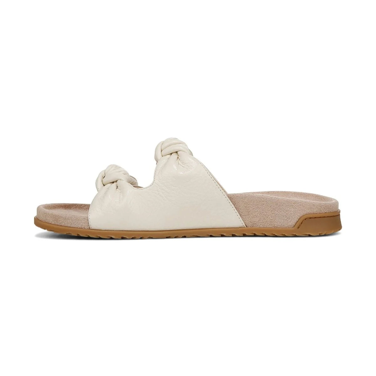 Beige sandal with a knot detail on a white background