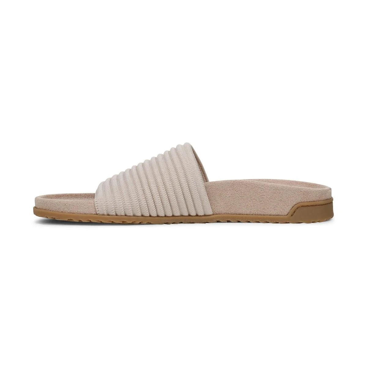 Beige slide sandal with a brown sole on a white background