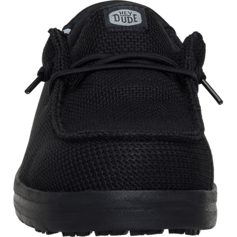 Black sneaker with 'Hey Dude' label on a white background