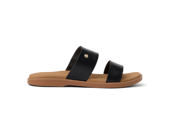 Black sandal with brown sole on a white background