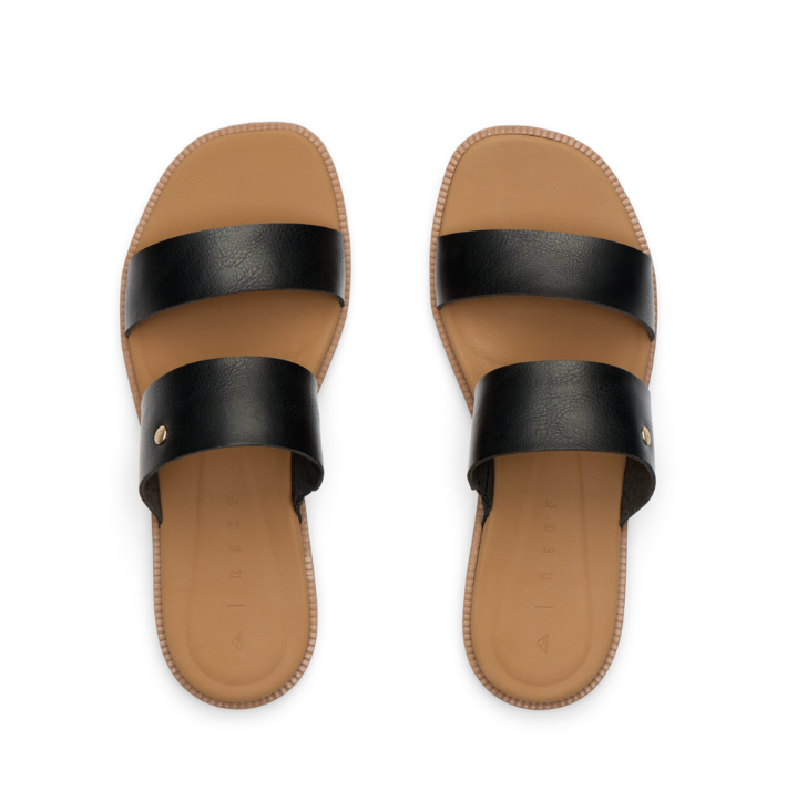 Pair of sandals with black straps on a white background