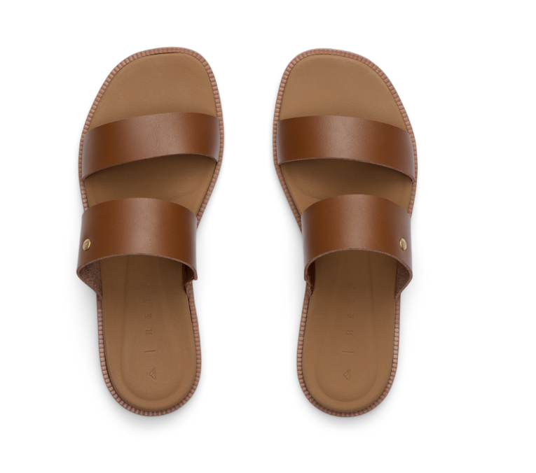Pair of brown sandals on a white background
