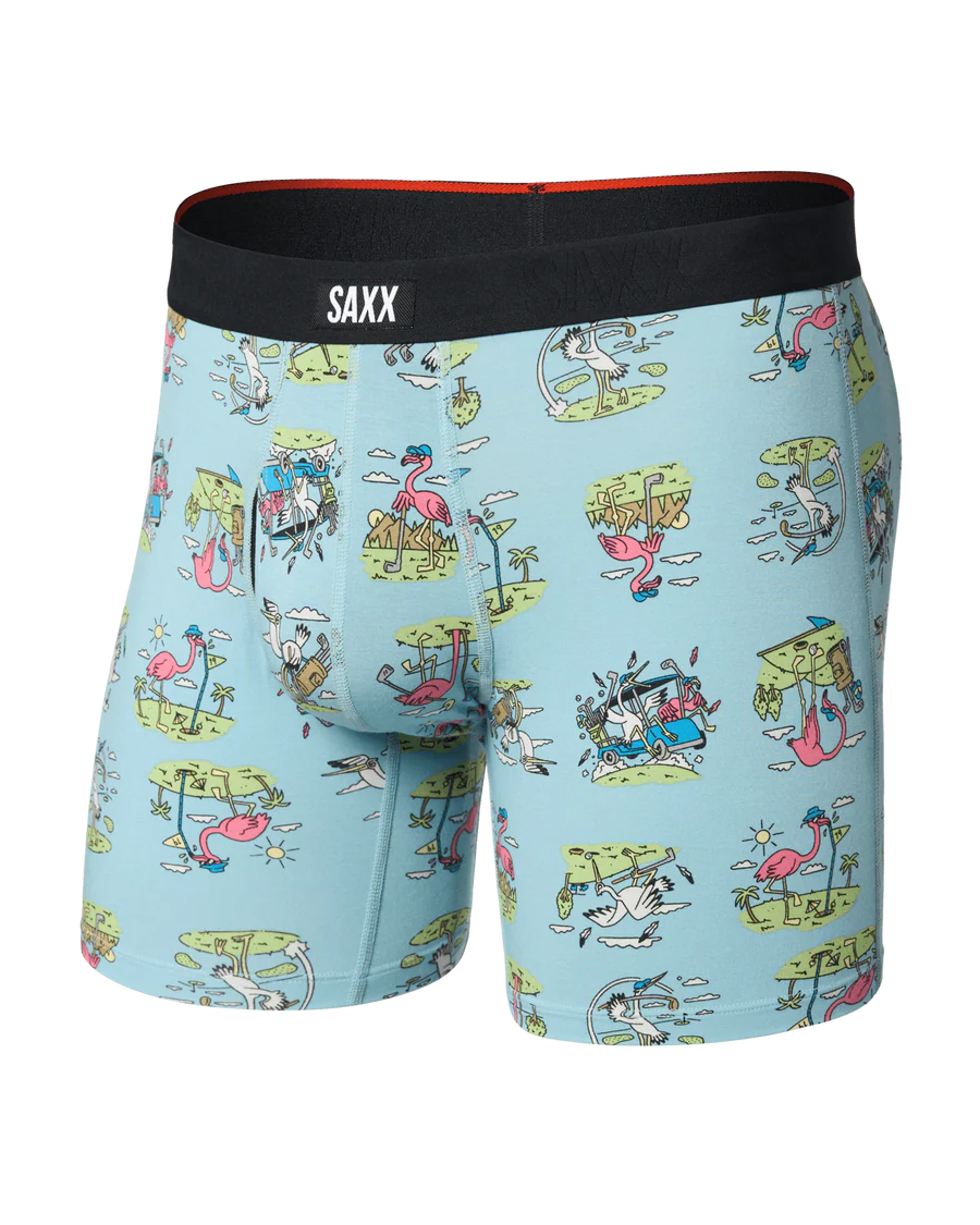 Blue boxer briefs with cartoon flamingo design and Saxx branding on a white background