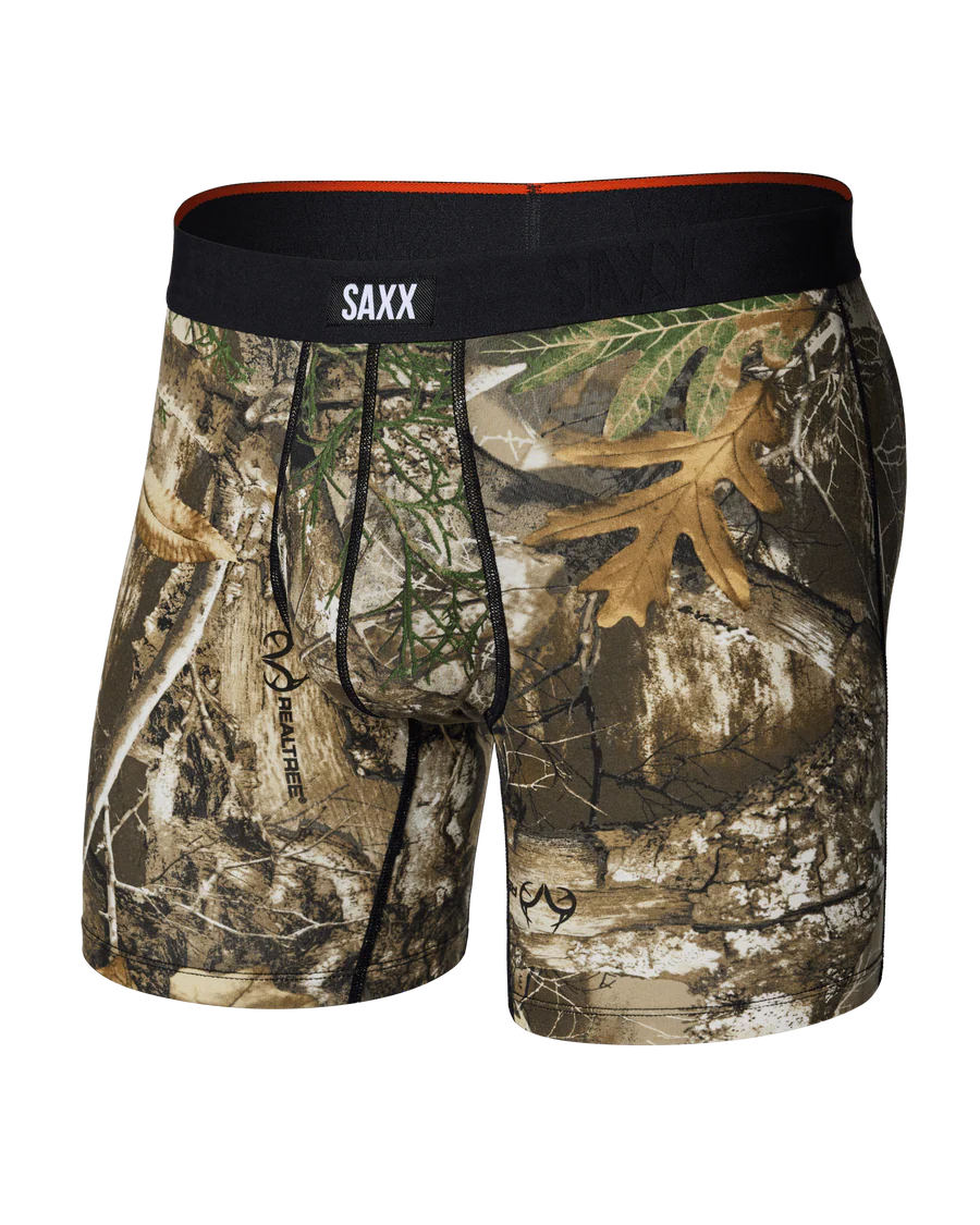 Camouflage boxer briefs with 'SAXX' branding on a white background