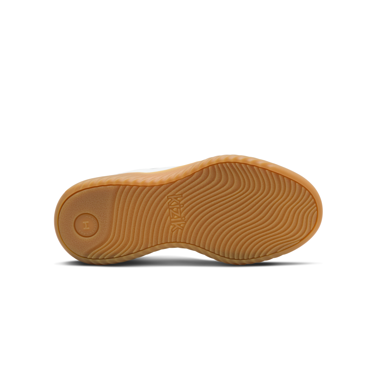 Brown sole of a shoe on a white background