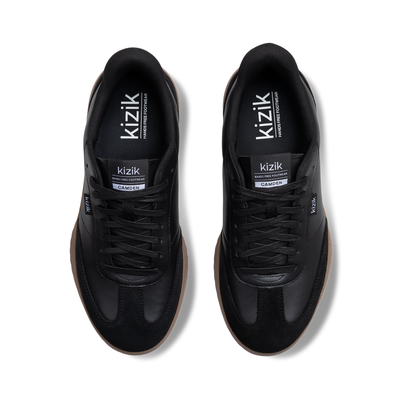 Black sneakers with 'kizik' branding on a white background