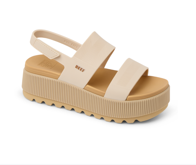 Beige sandal with a platform sole on a white background