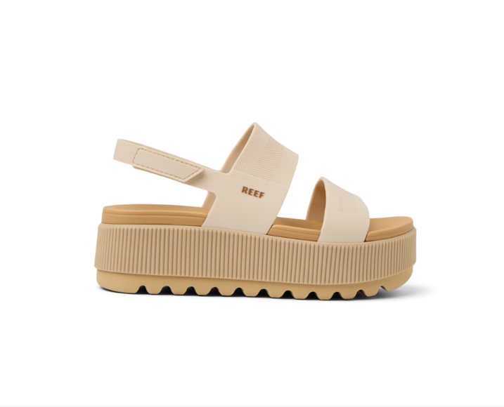 Beige sandal with platform sole on a white background