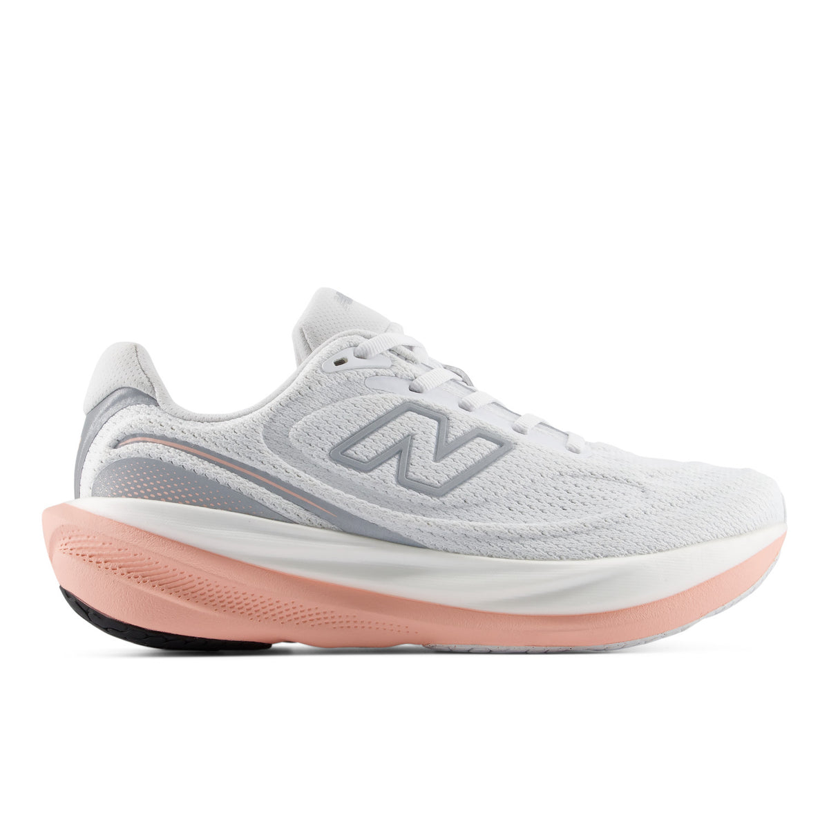 A New Balance running shoe in white and light gray with a peach-pink midsole, shown from a side profile on a white background.