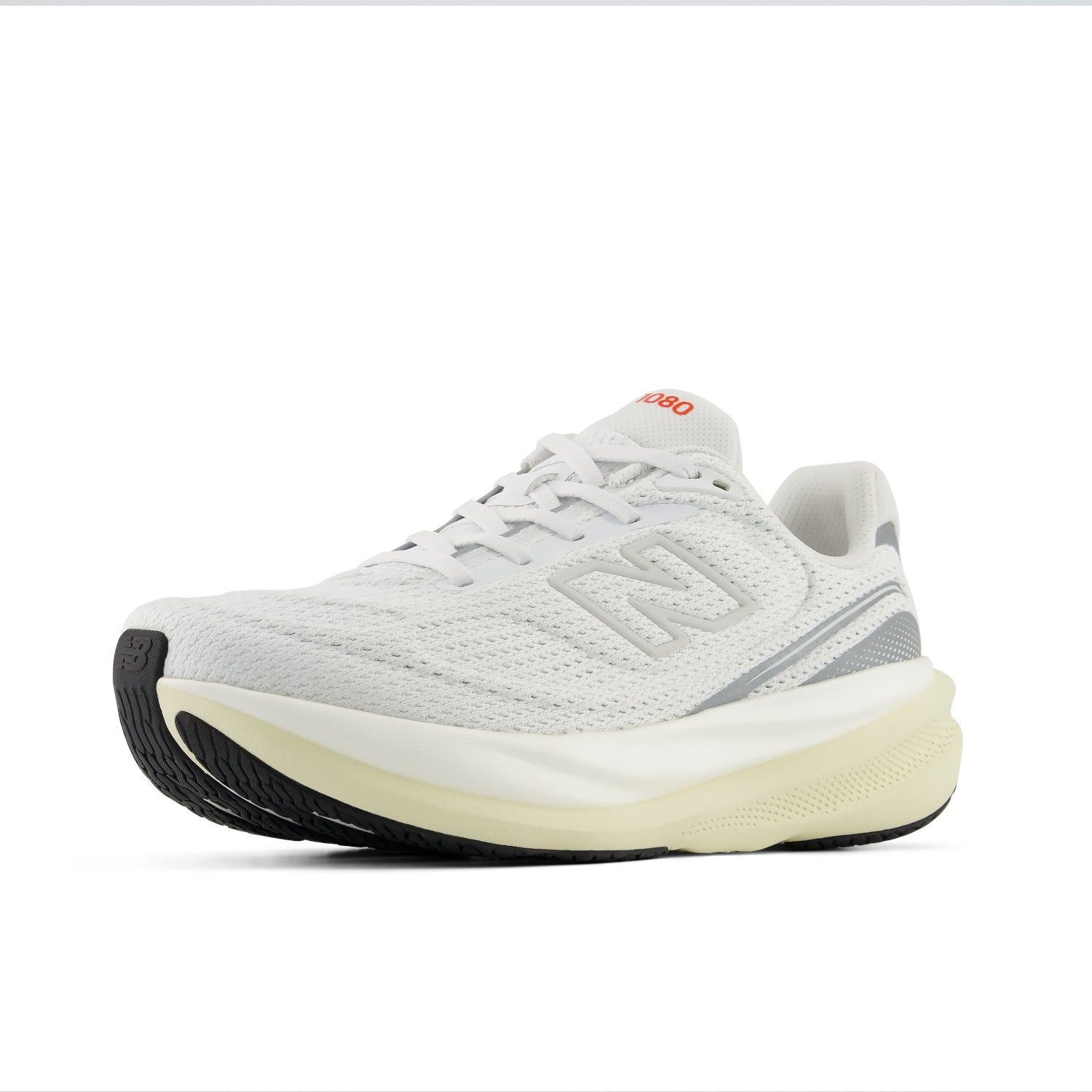 Beige sneaker with black sole on a white background