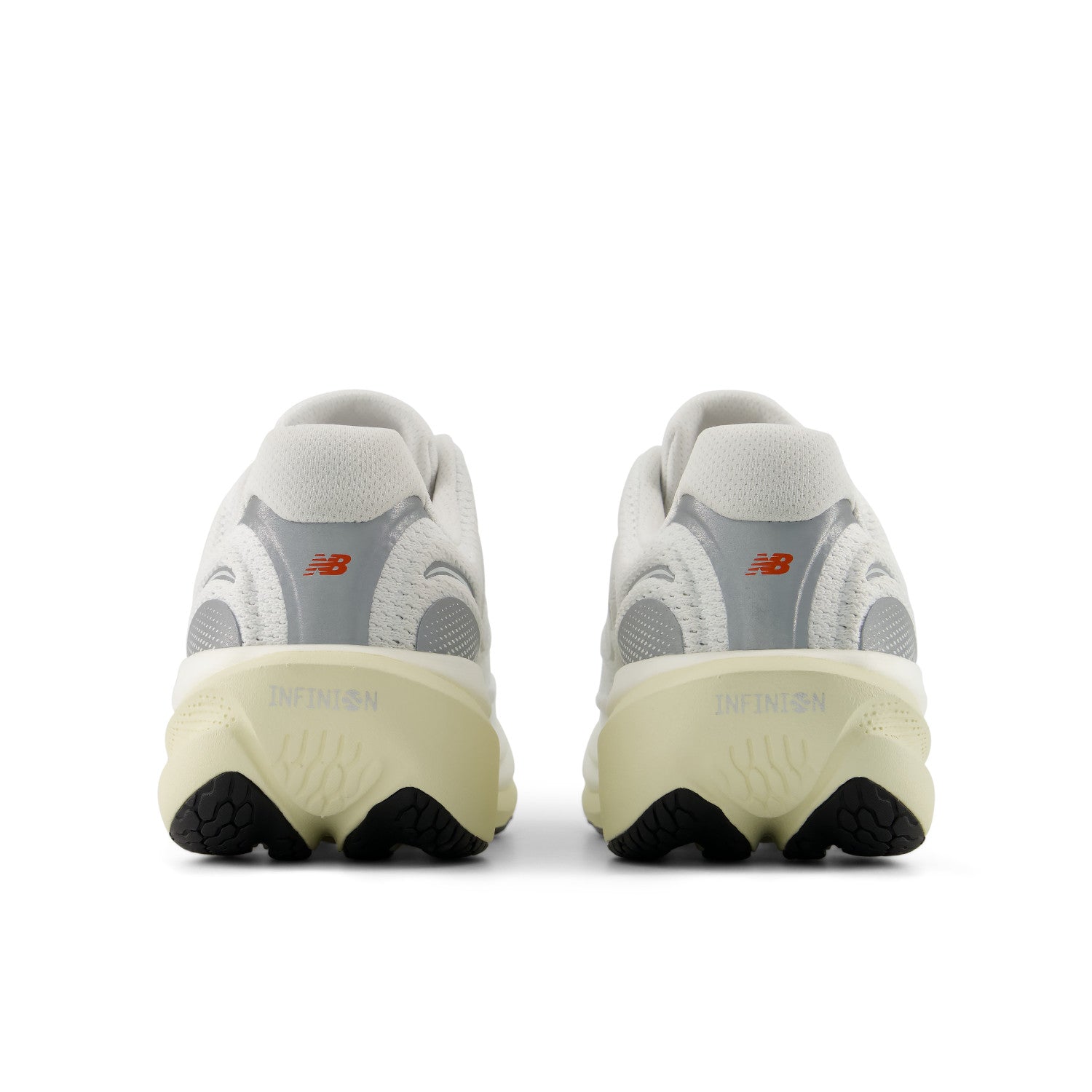 Pink sneakers with a white sole on a light gray background