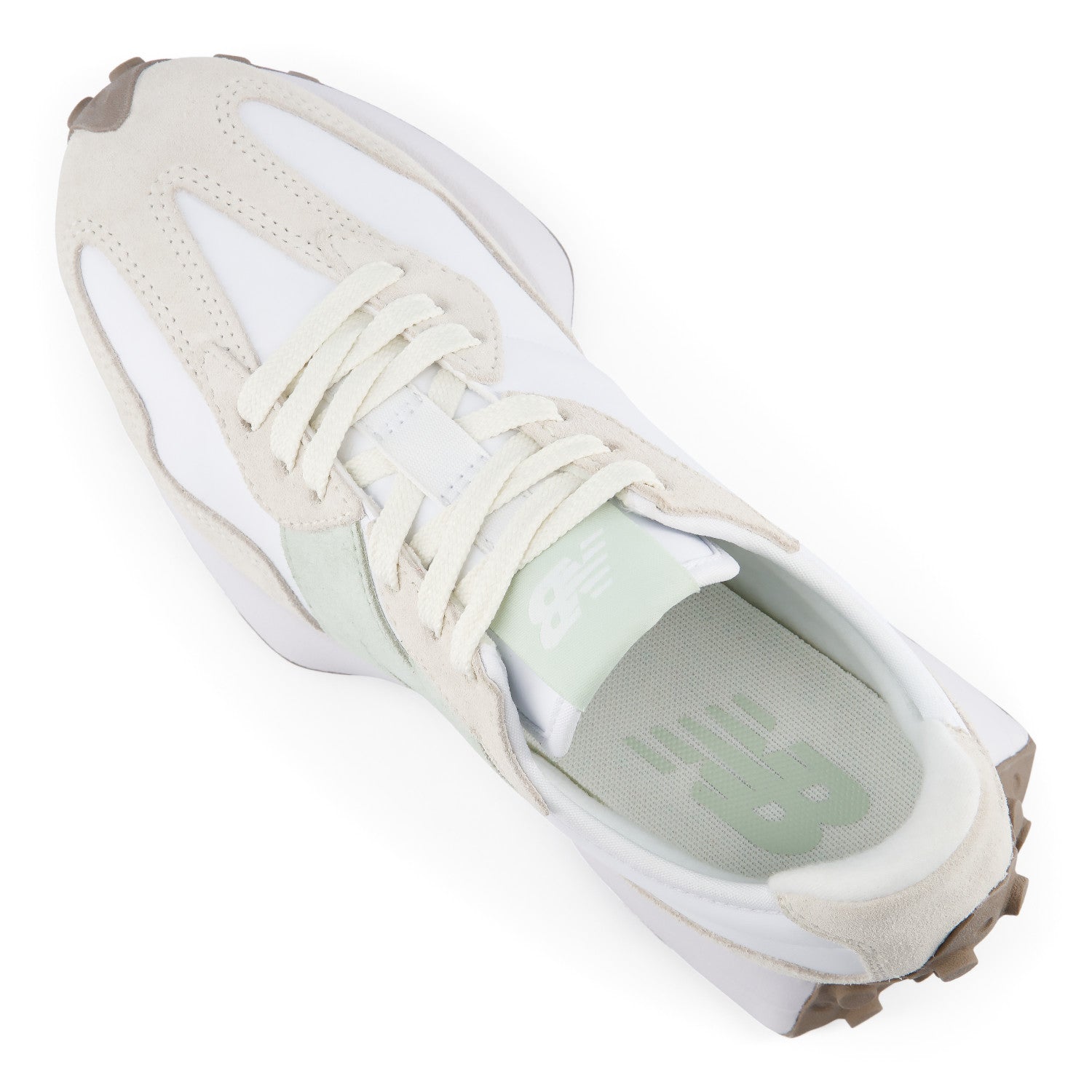 White sneaker with beige accents on a white background