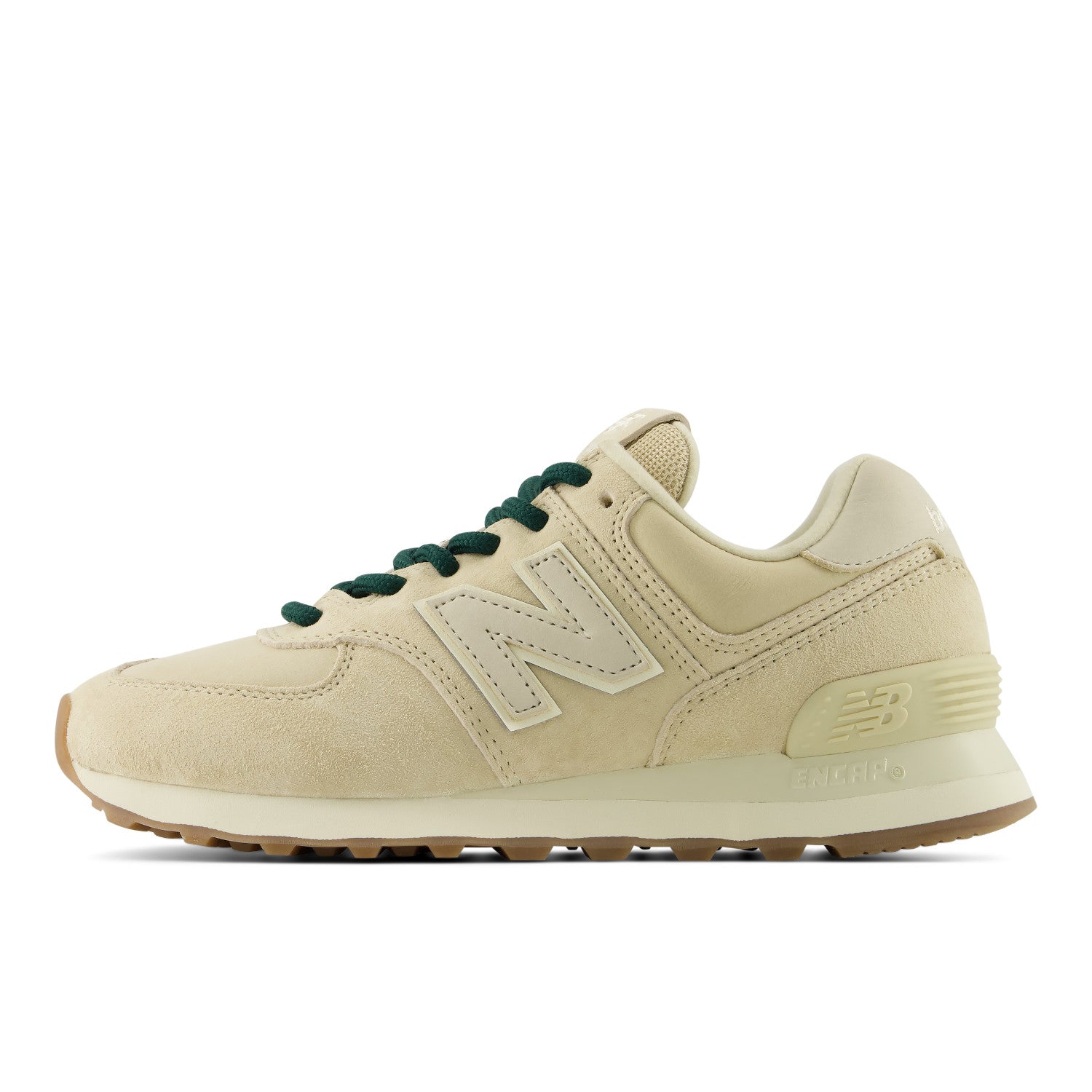Beige sneaker with green laces on a white background
