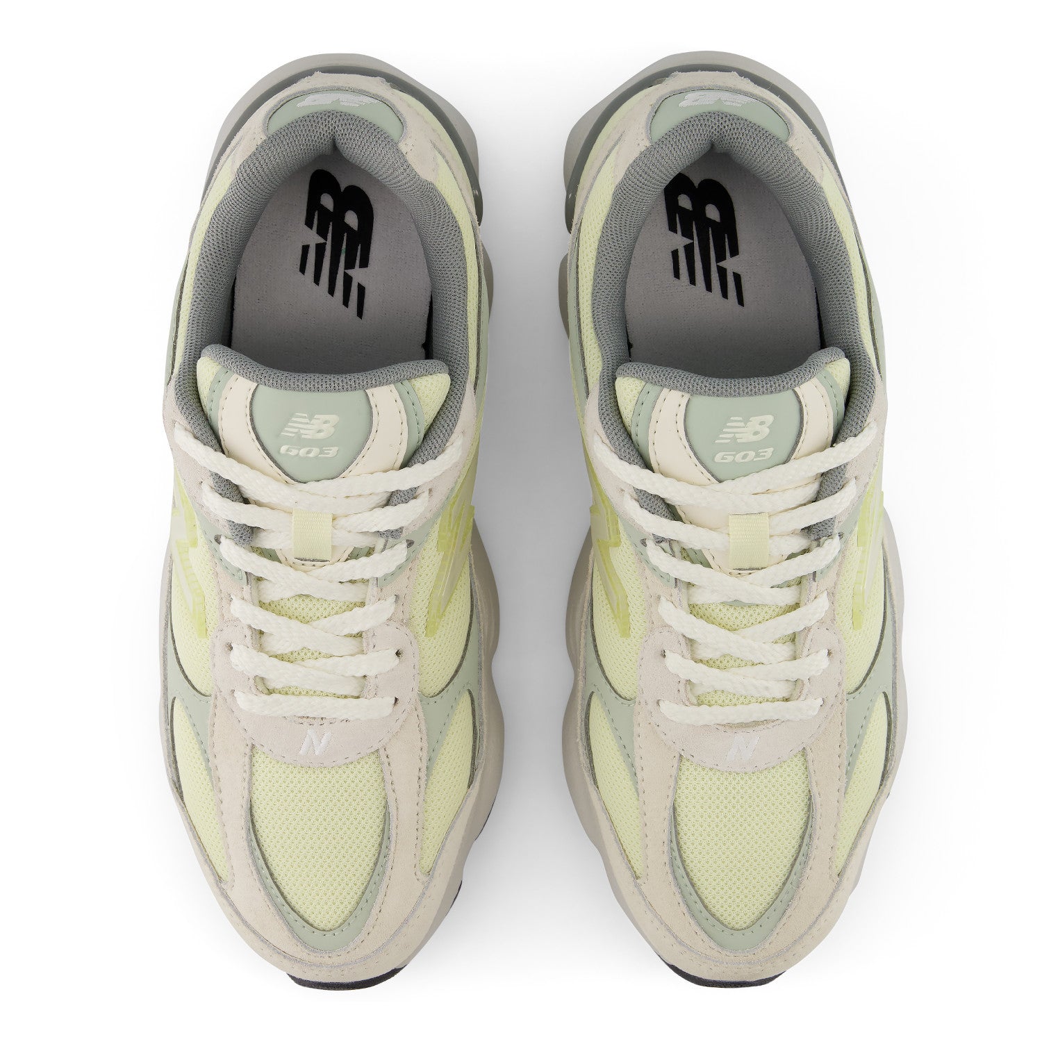Pair of light green and gray sneakers on a white background