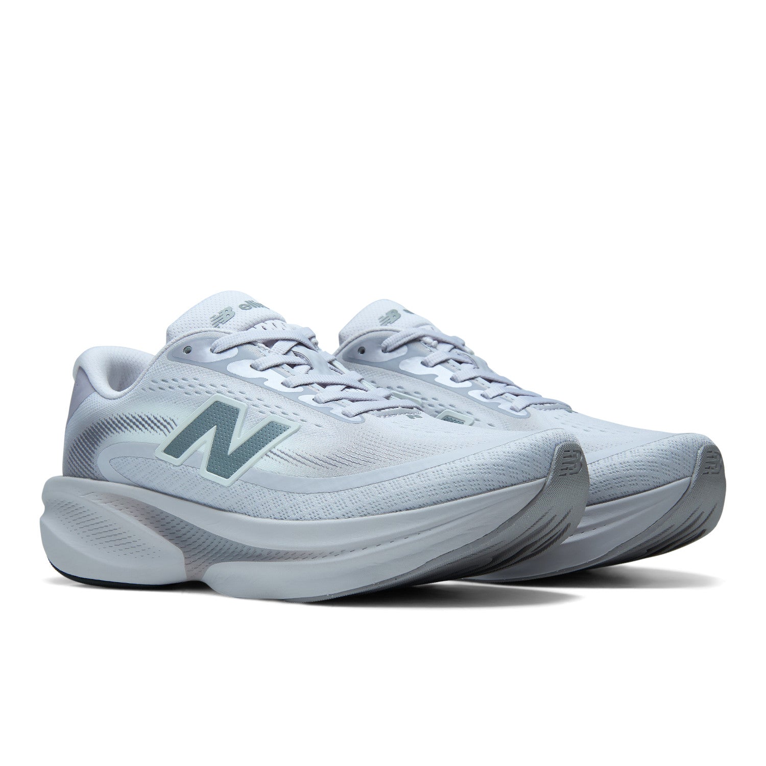 A pair of New Balance running shoes in light gray and white with a dark gray 'N' logo on the side, shown against a plain white background.