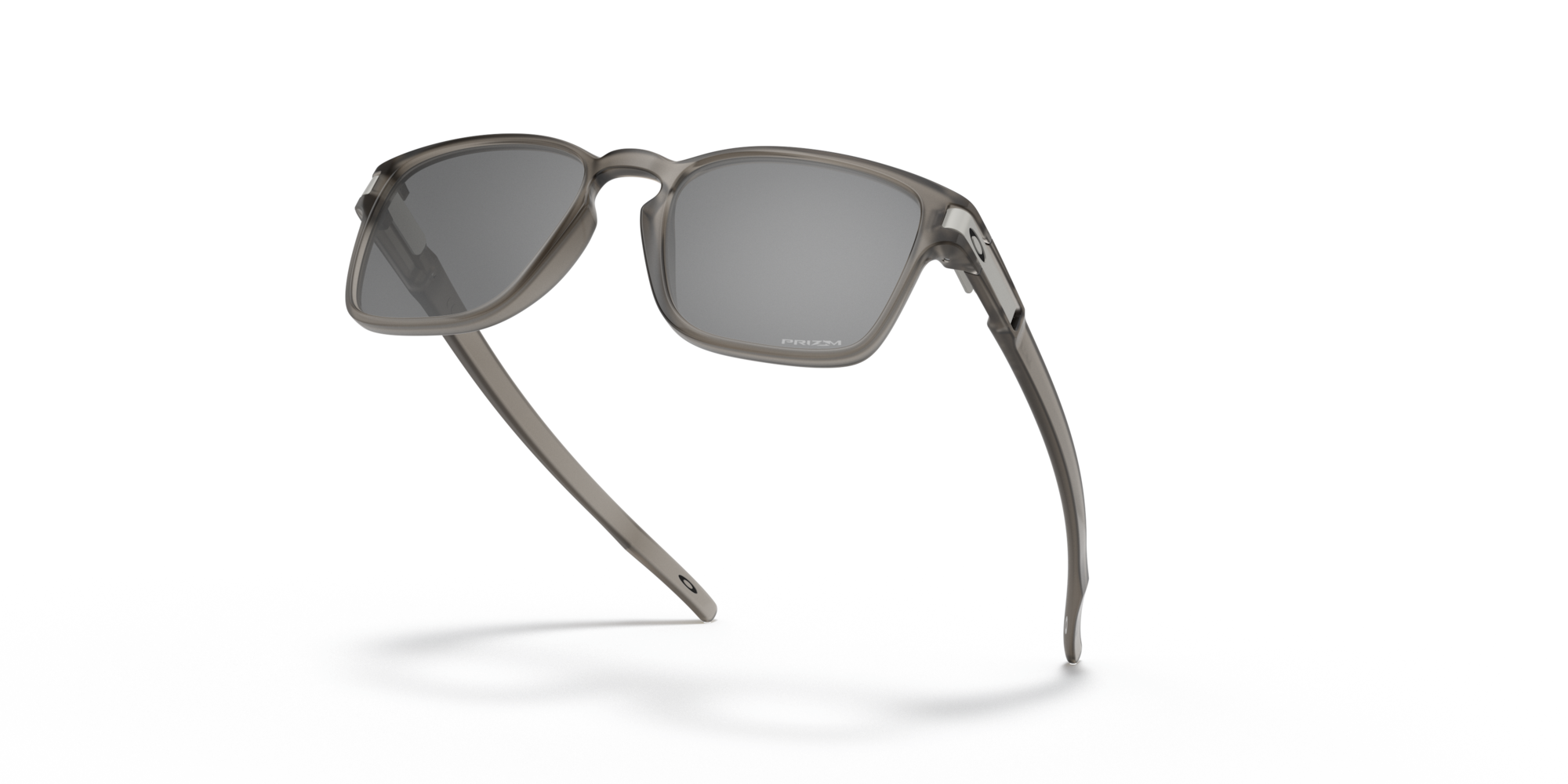 Sunglasses with dark lenses on a white background