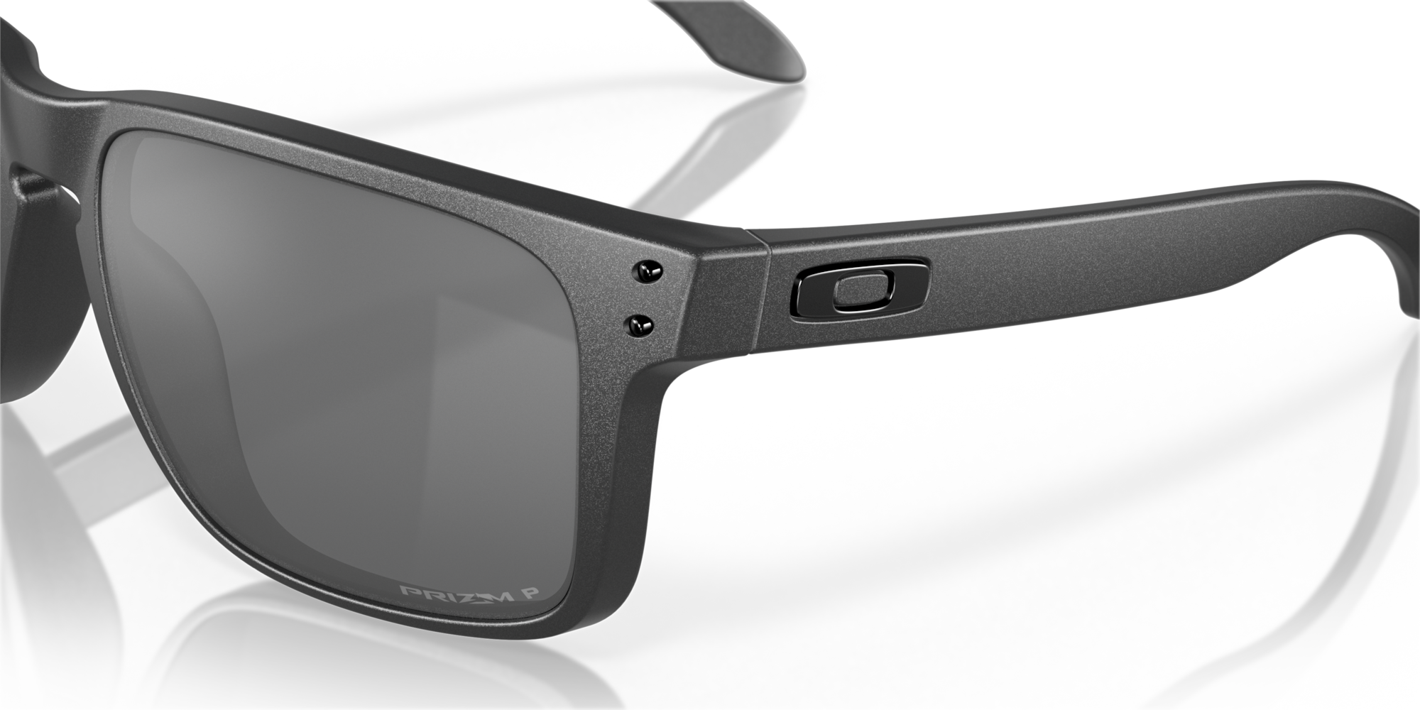 Gray sunglasses with a reflective surface on a black background
