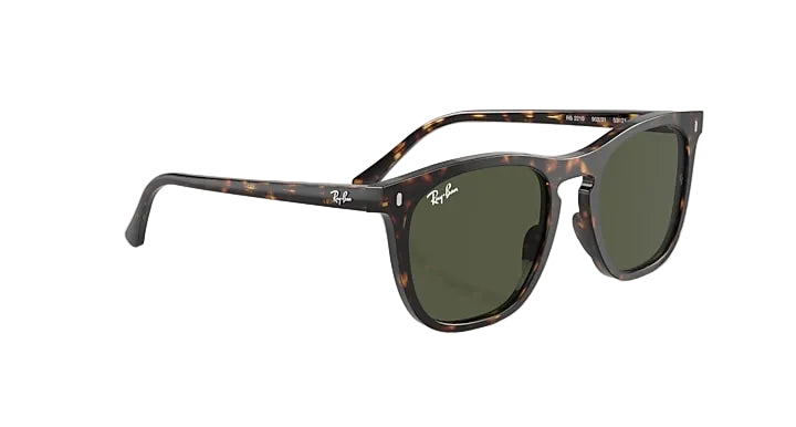Tortoiseshell sunglasses with green lenses on a white background