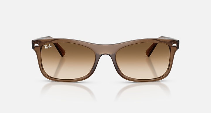 Brown sunglasses with gradient lenses on a white background
