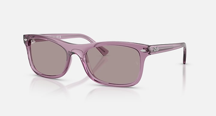 Purple sunglasses on a white background