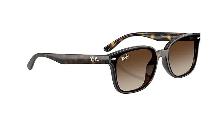 Ray-Ban sunglasses with tortoiseshell frame and gradient lenses on a white background