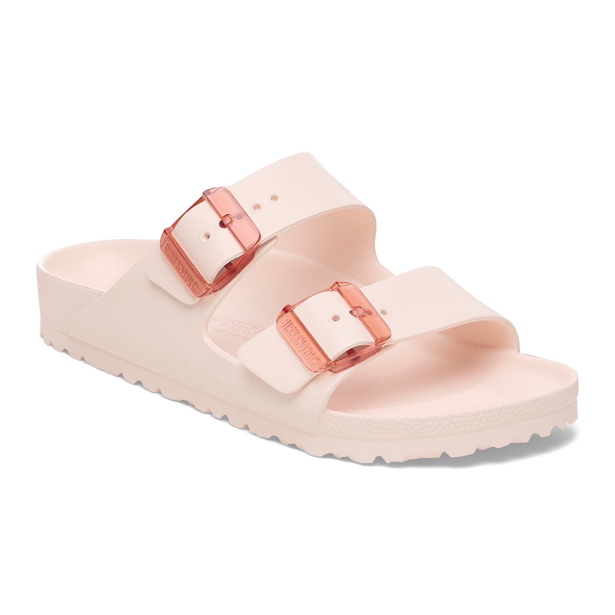 Beige sandal with rose gold buckles on a white background