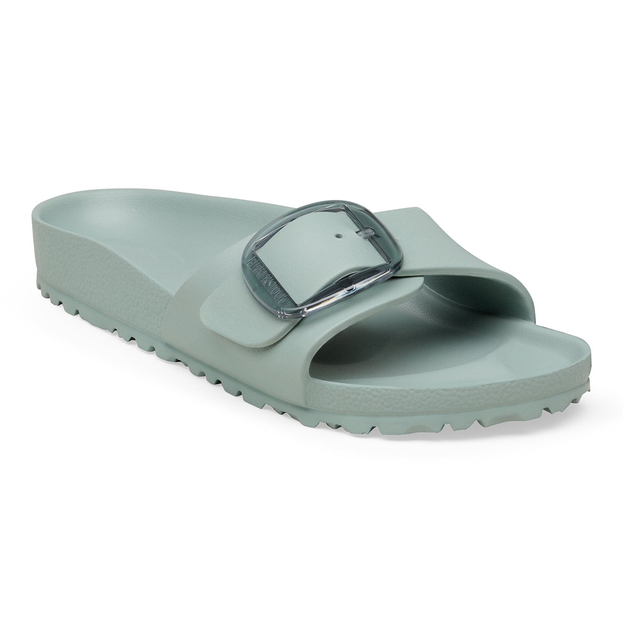 Green slide sandal with a buckle on a white background