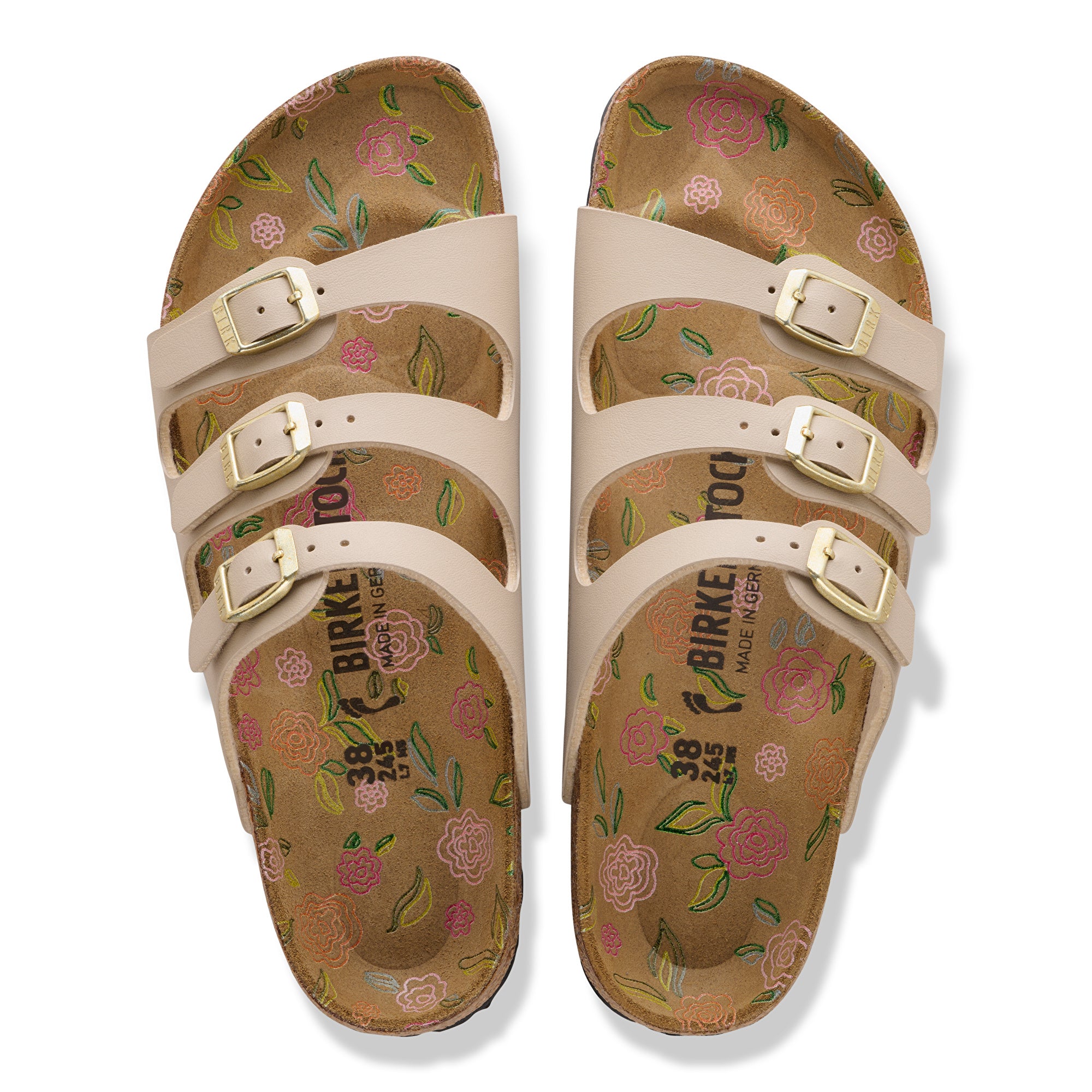 Pair of Birkenstock sandals with floral design on a white background