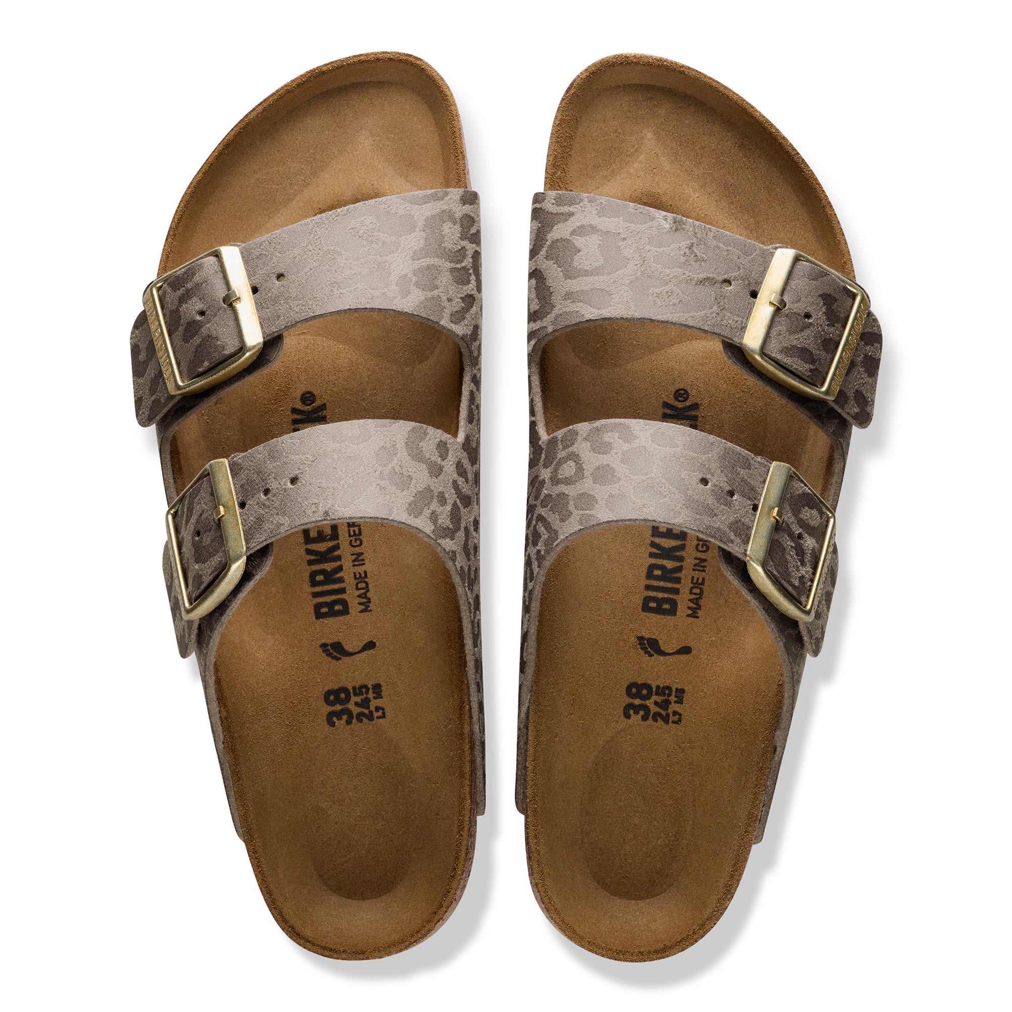 Pair of Birkenstock sandals with patterned straps on a white background