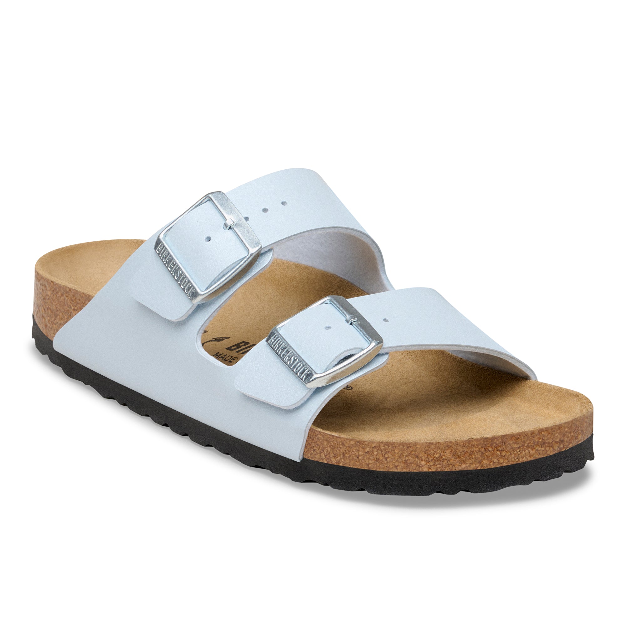 baby blue sandal with cork sole on a white background