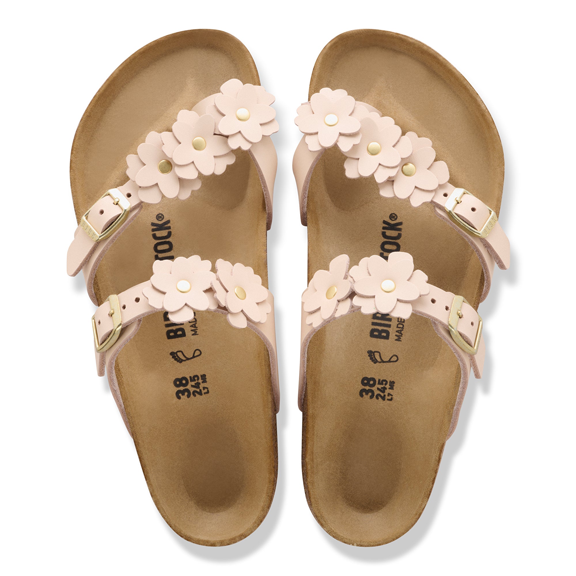 Pair of sandals with floral straps on a white background