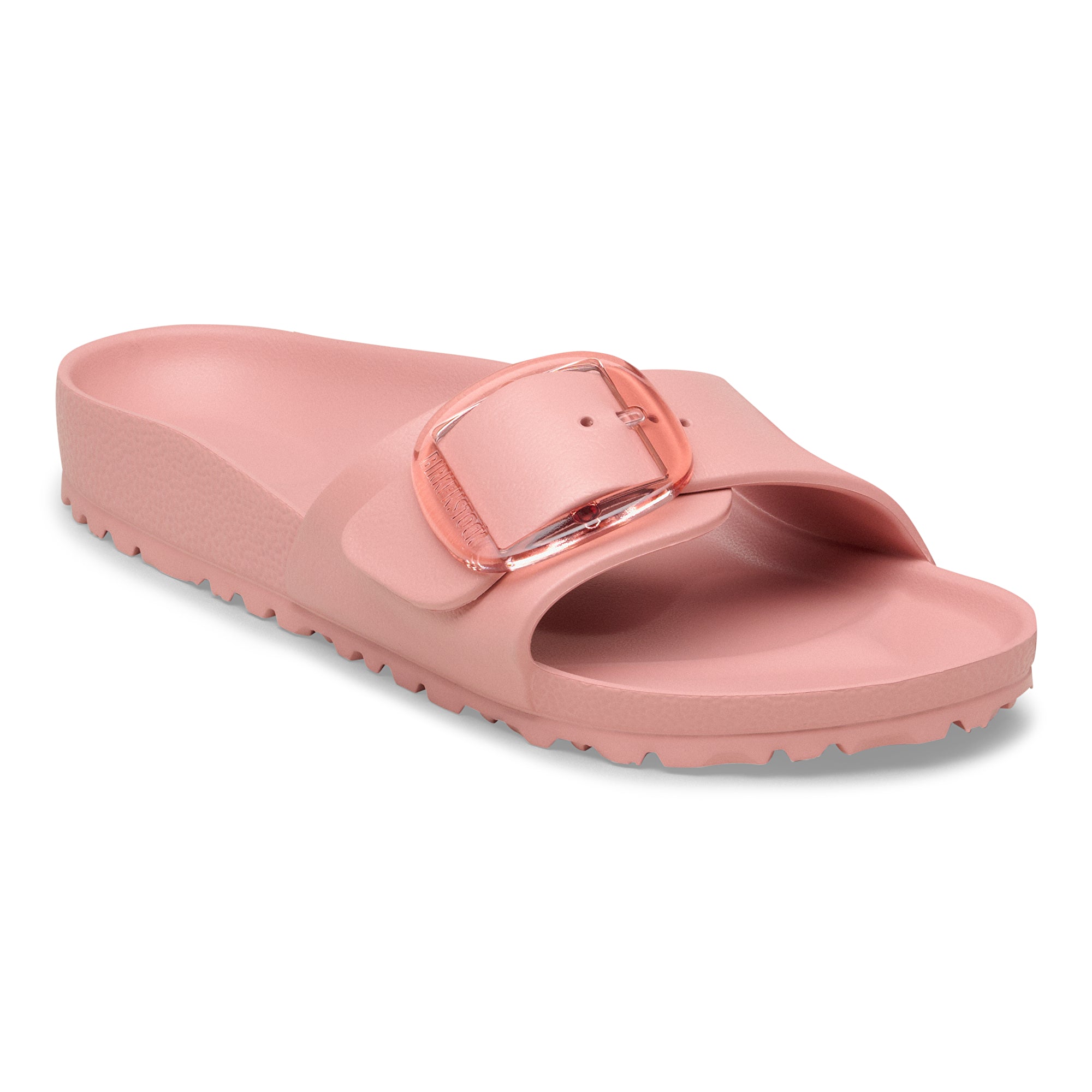 Pink sandal with a strap on a white background