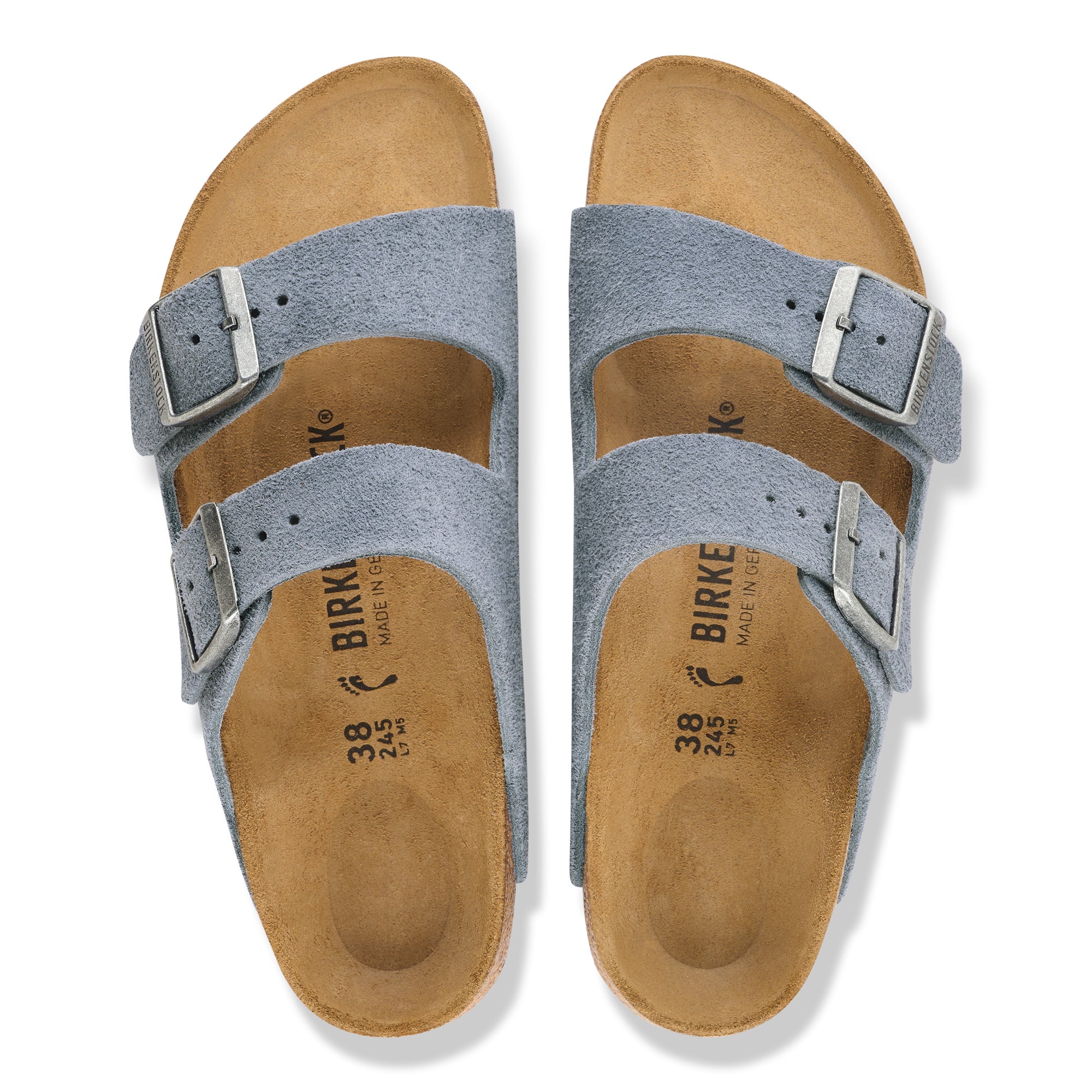 Pair of Birkenstock sandals with blue straps on a white background