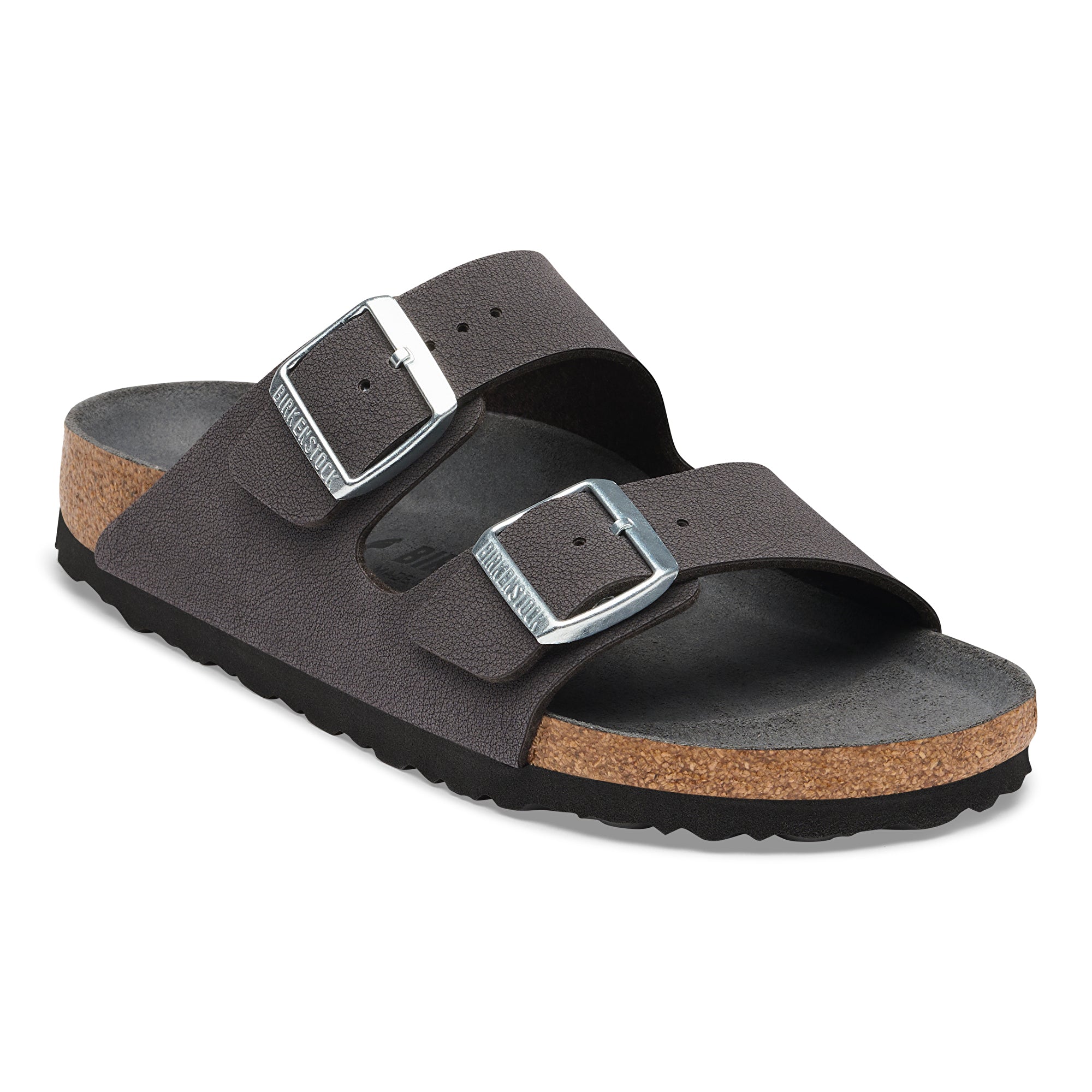 Brown sandal with cork sole on a white background