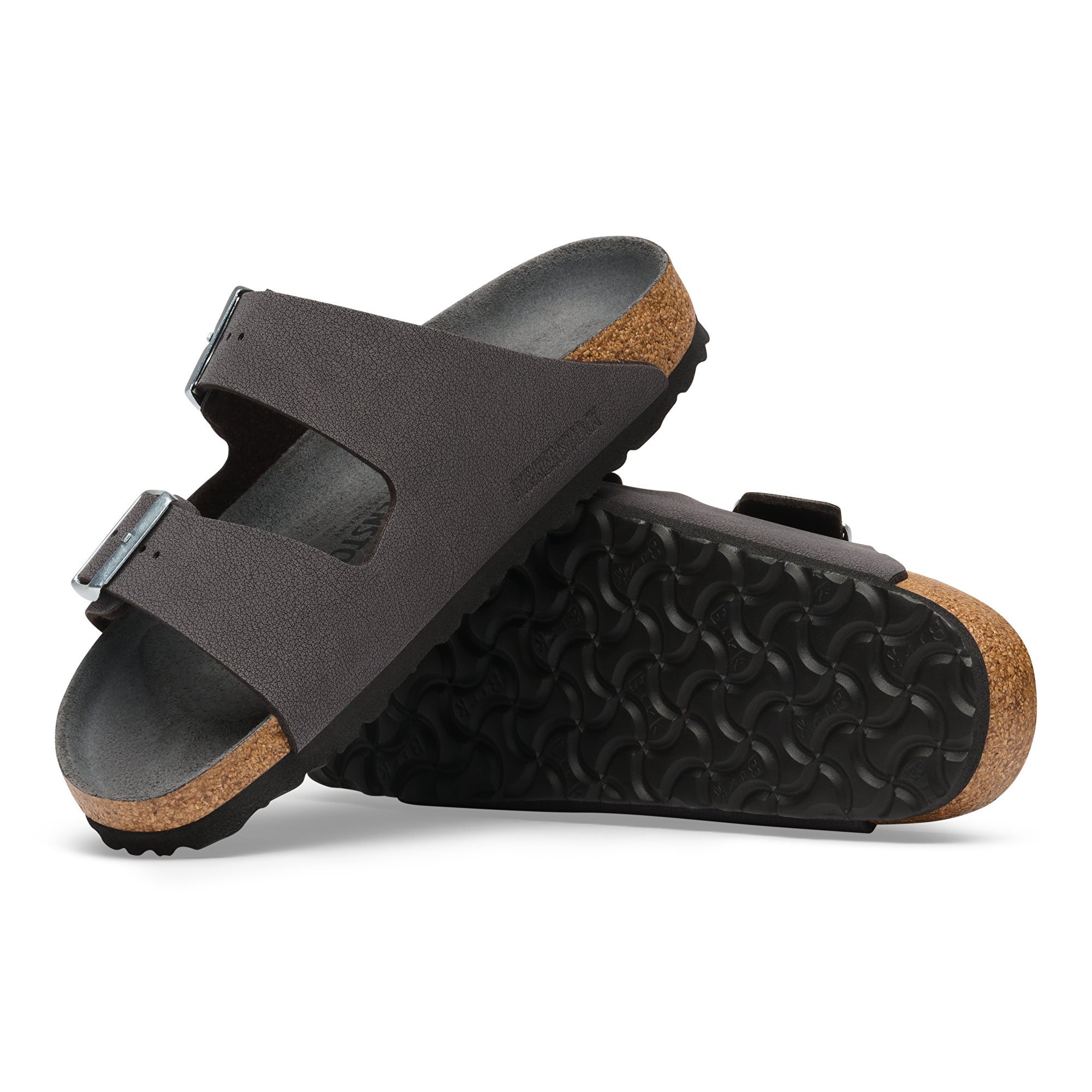 Black sandals with cork sole on a white background