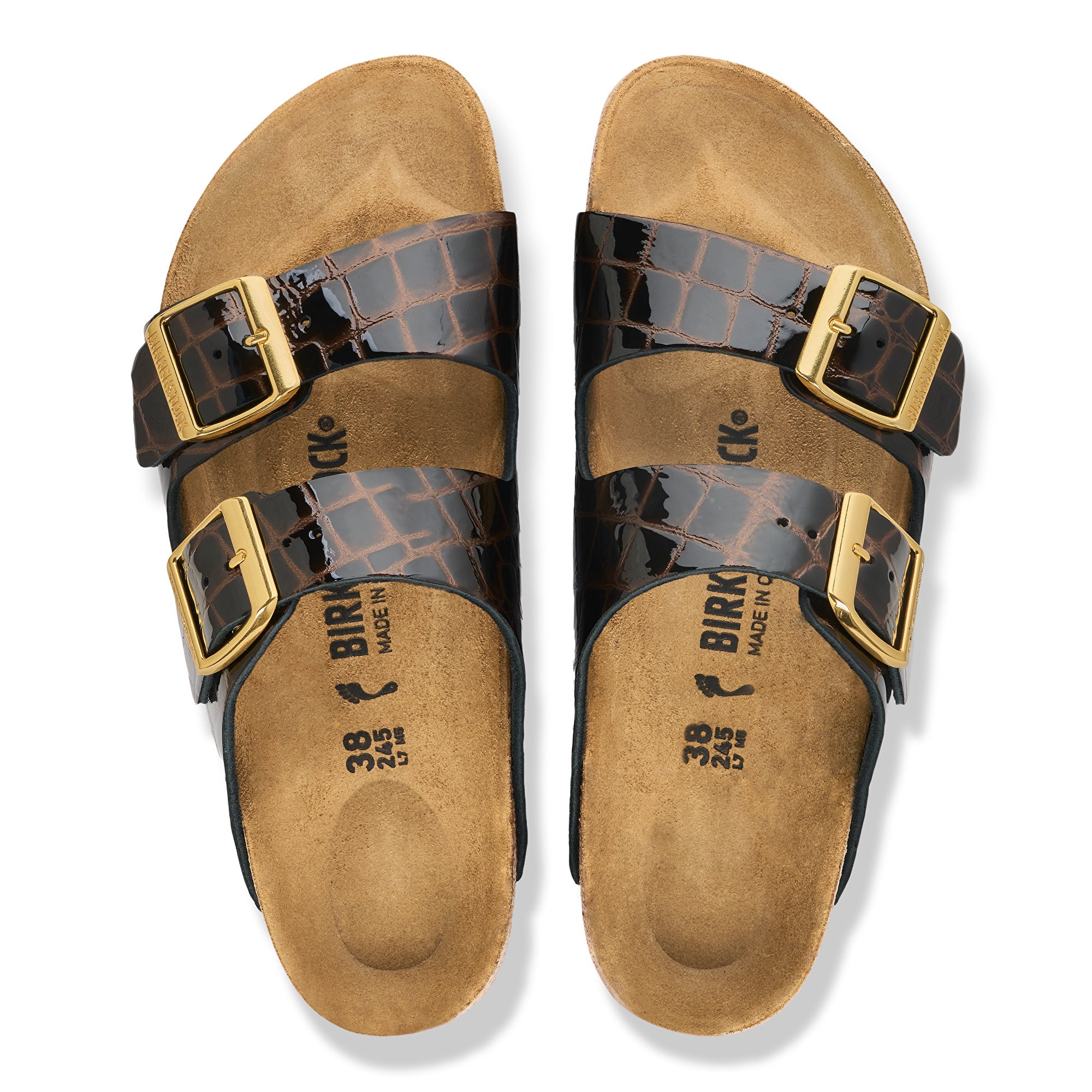 Pair of Birkenstock sandals with brown and black straps on a white background