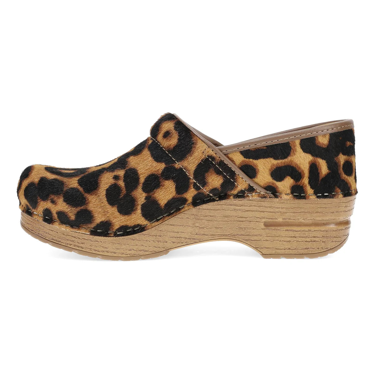 A single clog shoe with a brown and black leopard print upper and a natural wood-look wedge sole, shown in profile against a white background.