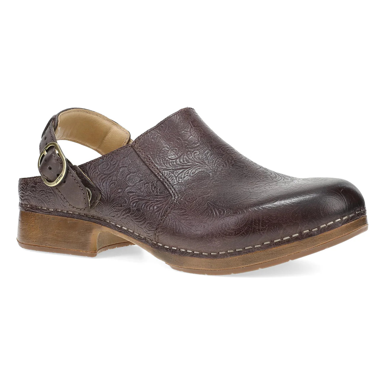 Brown leather clog shoe with embossed design on a white background
