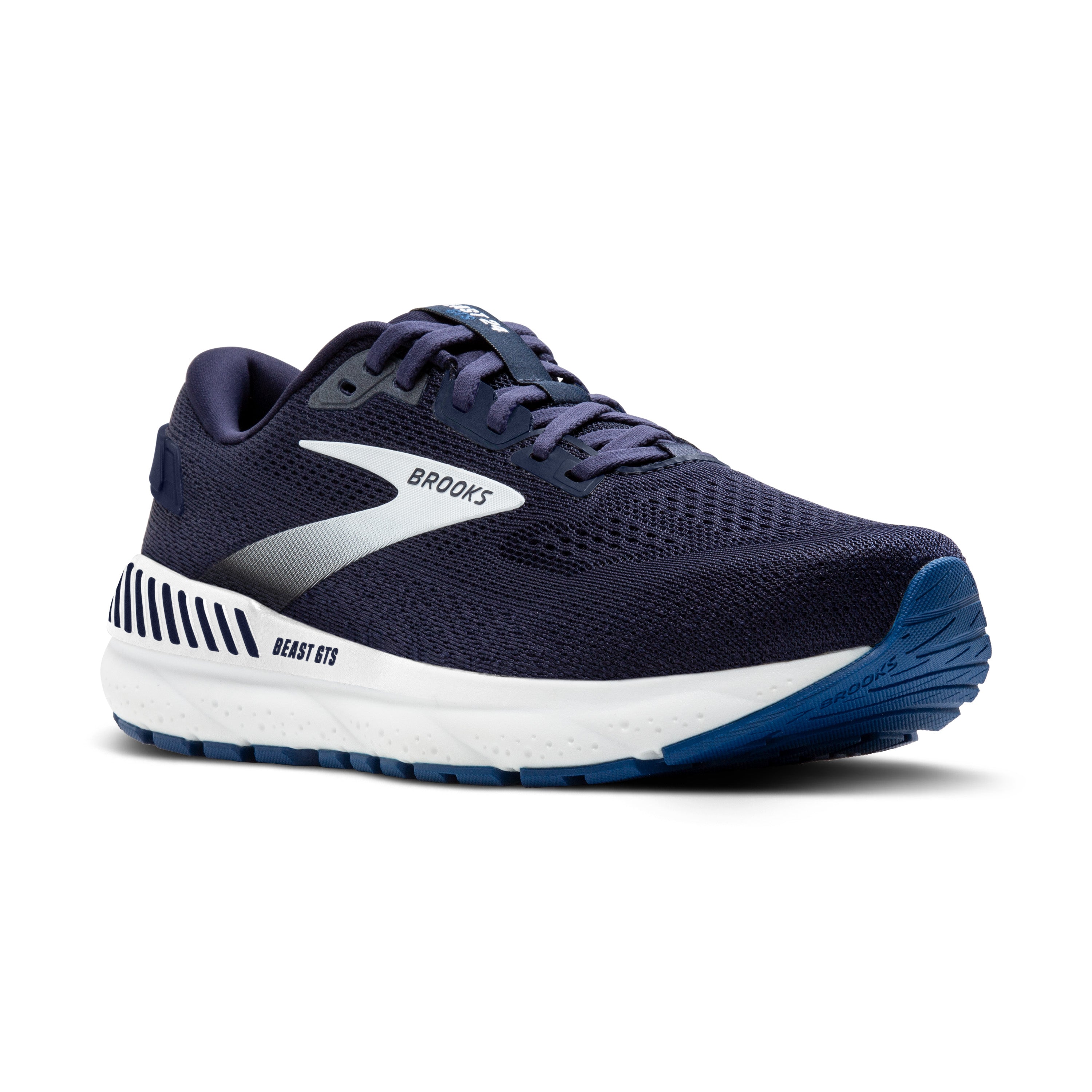 Navy running shoe with white sole on a white background
