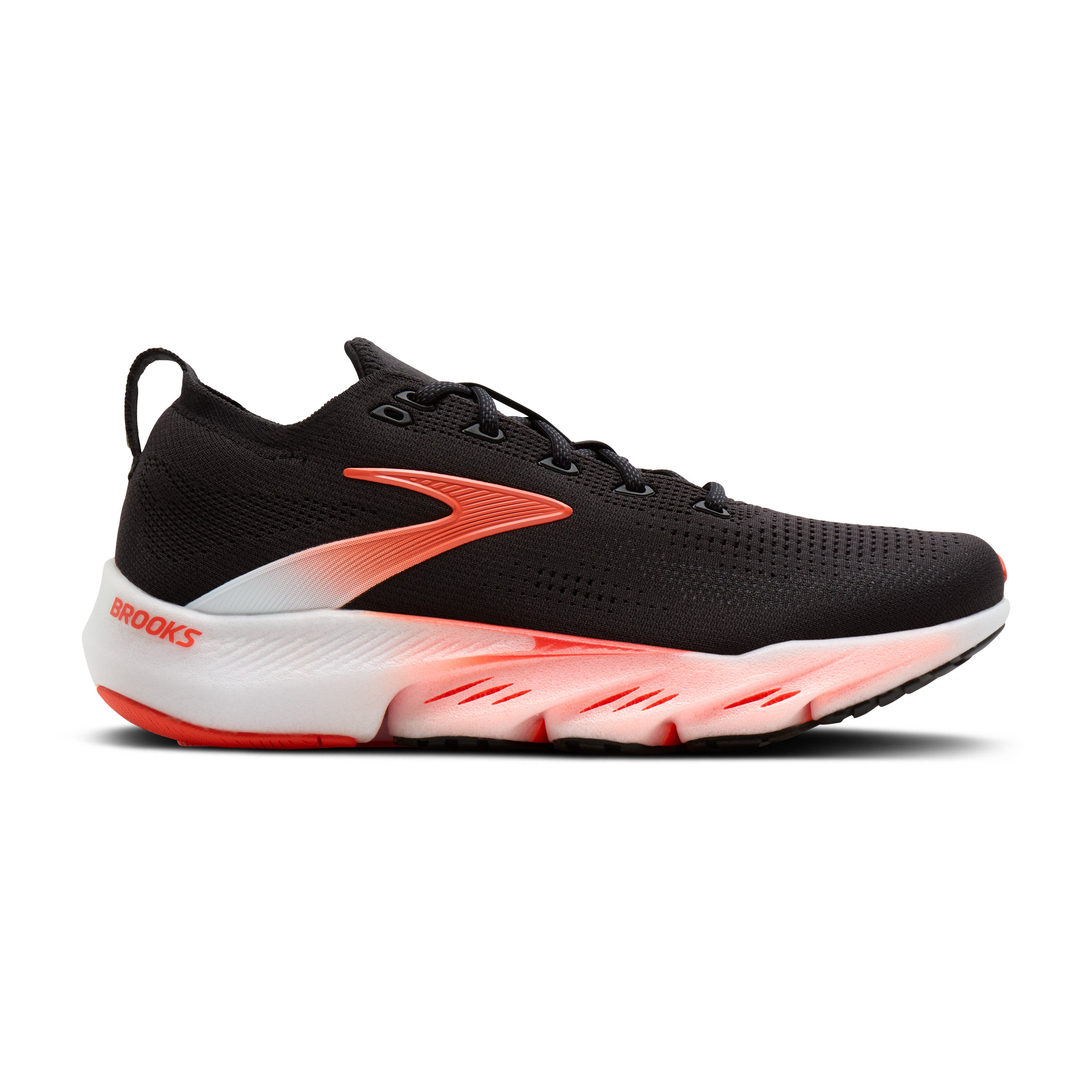 Black running shoe with pink sole on a white background