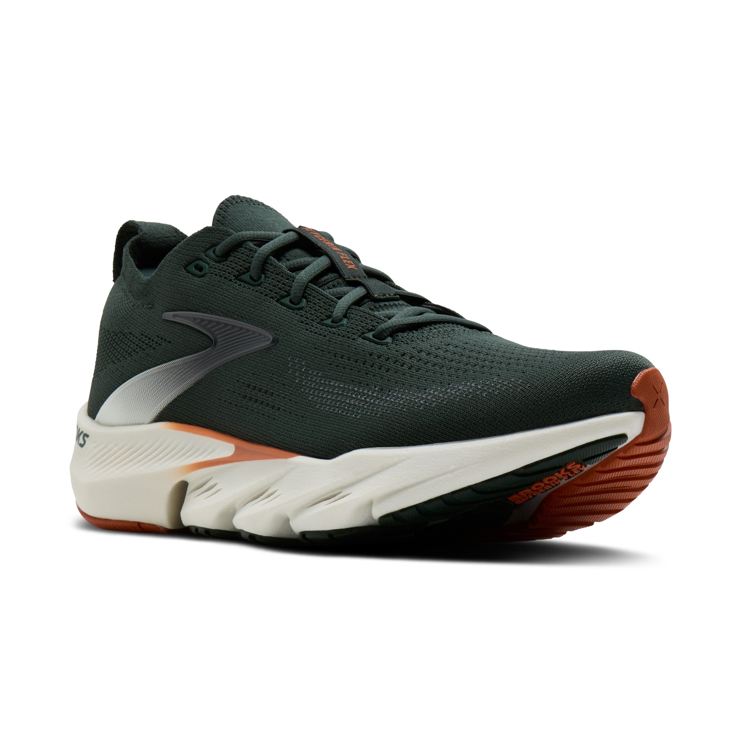 Green running shoe with white sole on a white background