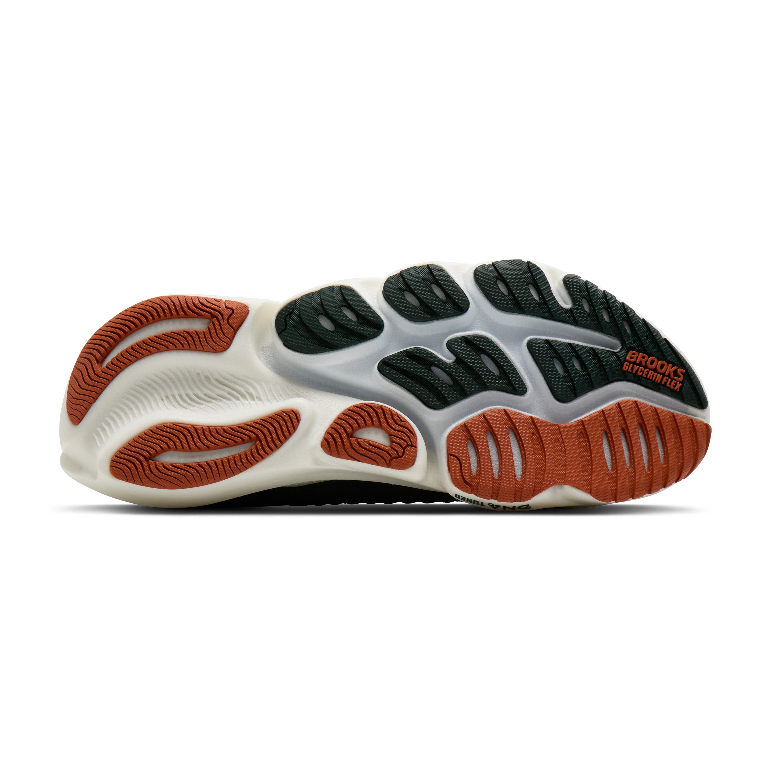 Sole of a running shoe with brown, black, and white design on a white background