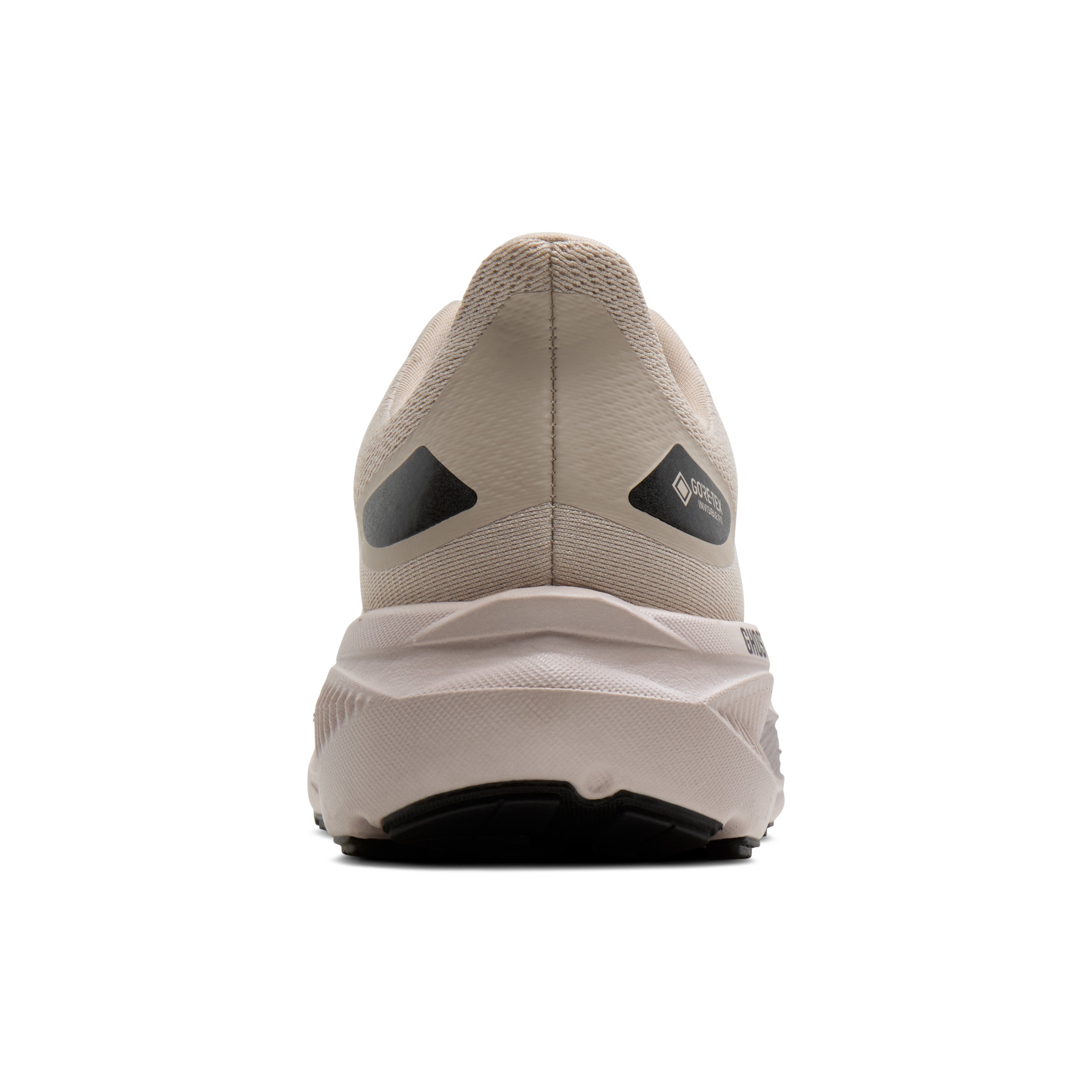 A rear view of a beige running shoe with black heel accents and a black outsole, shown on a solid white background.