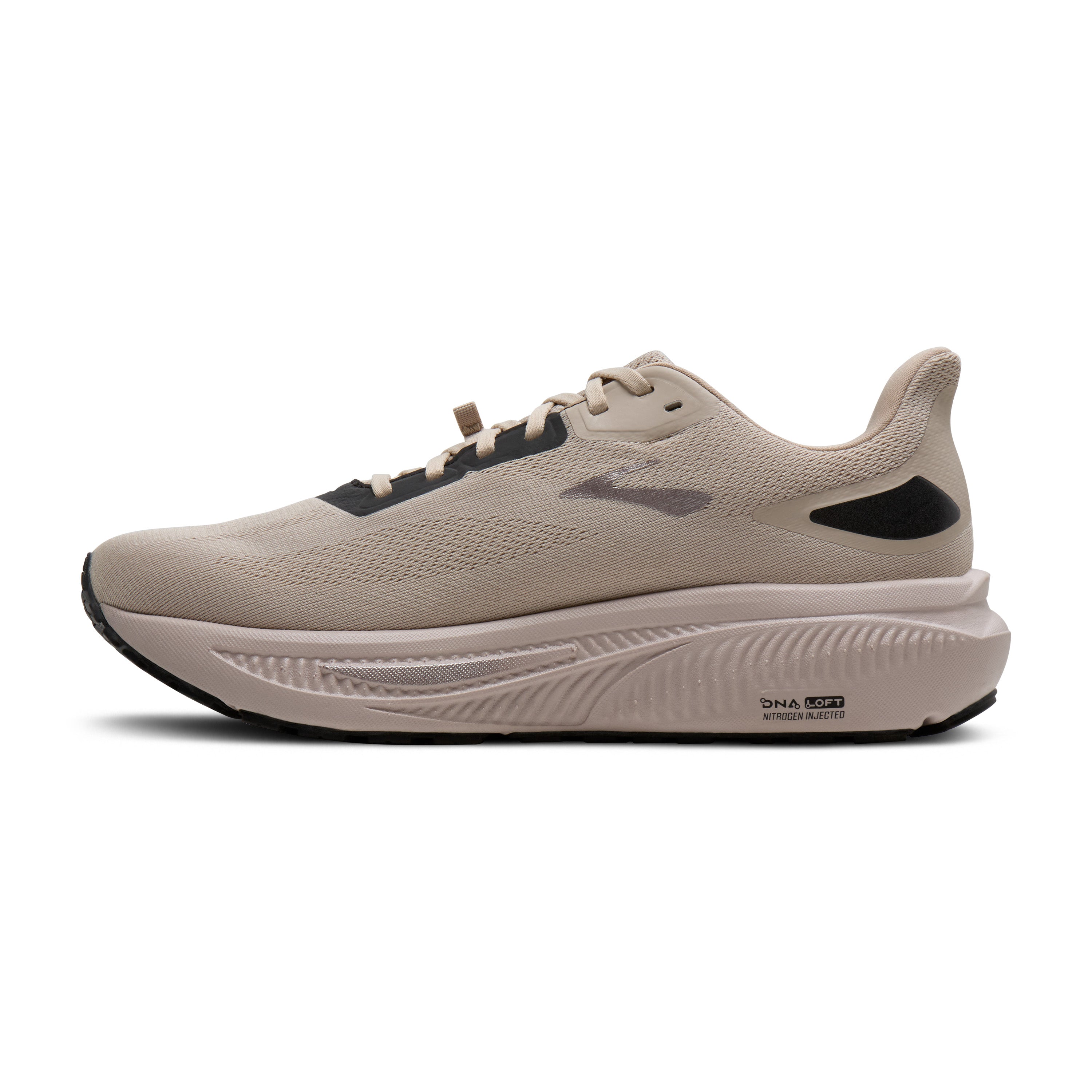 Beige running shoe with black accents on a white background