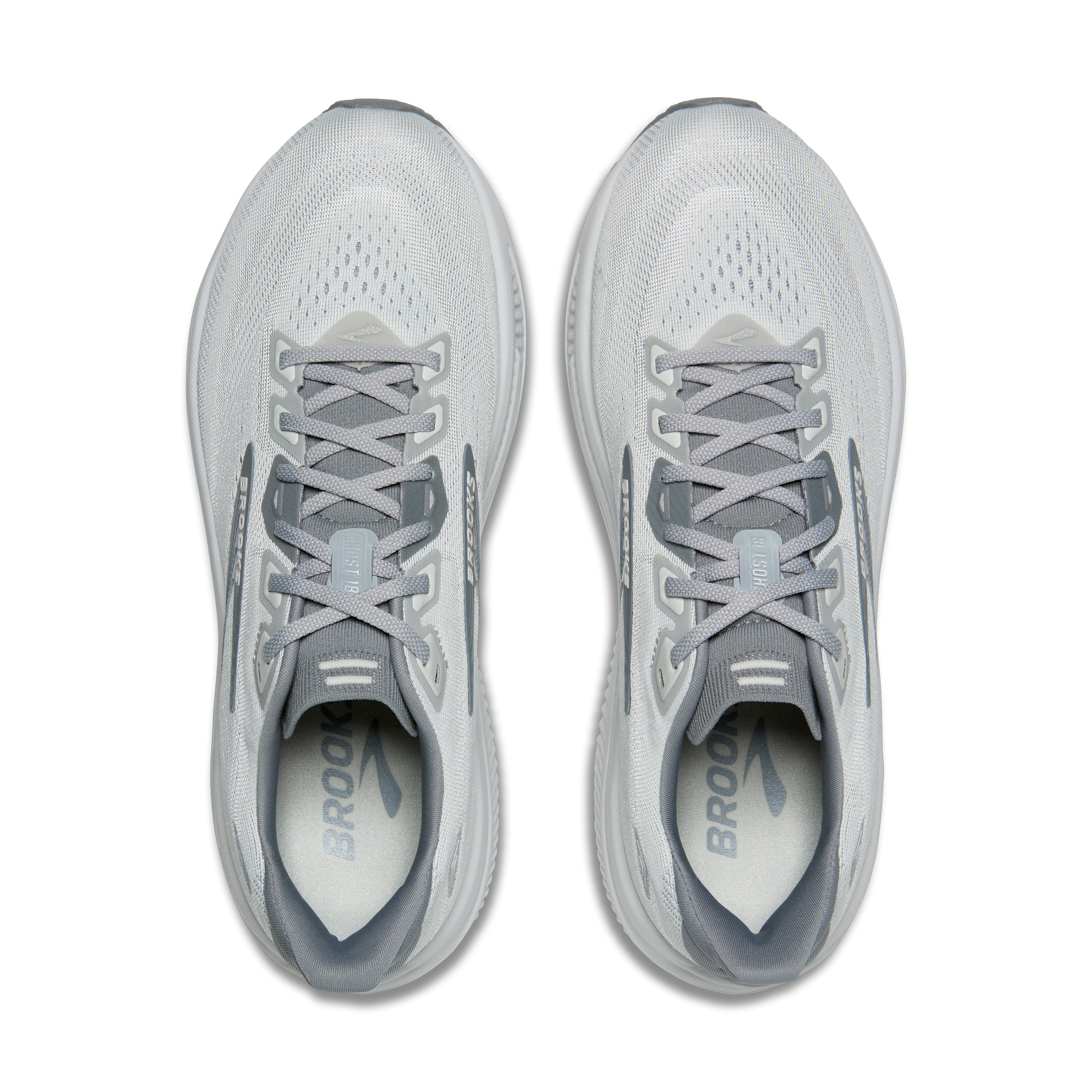 Gray running shoes with laces on a white background