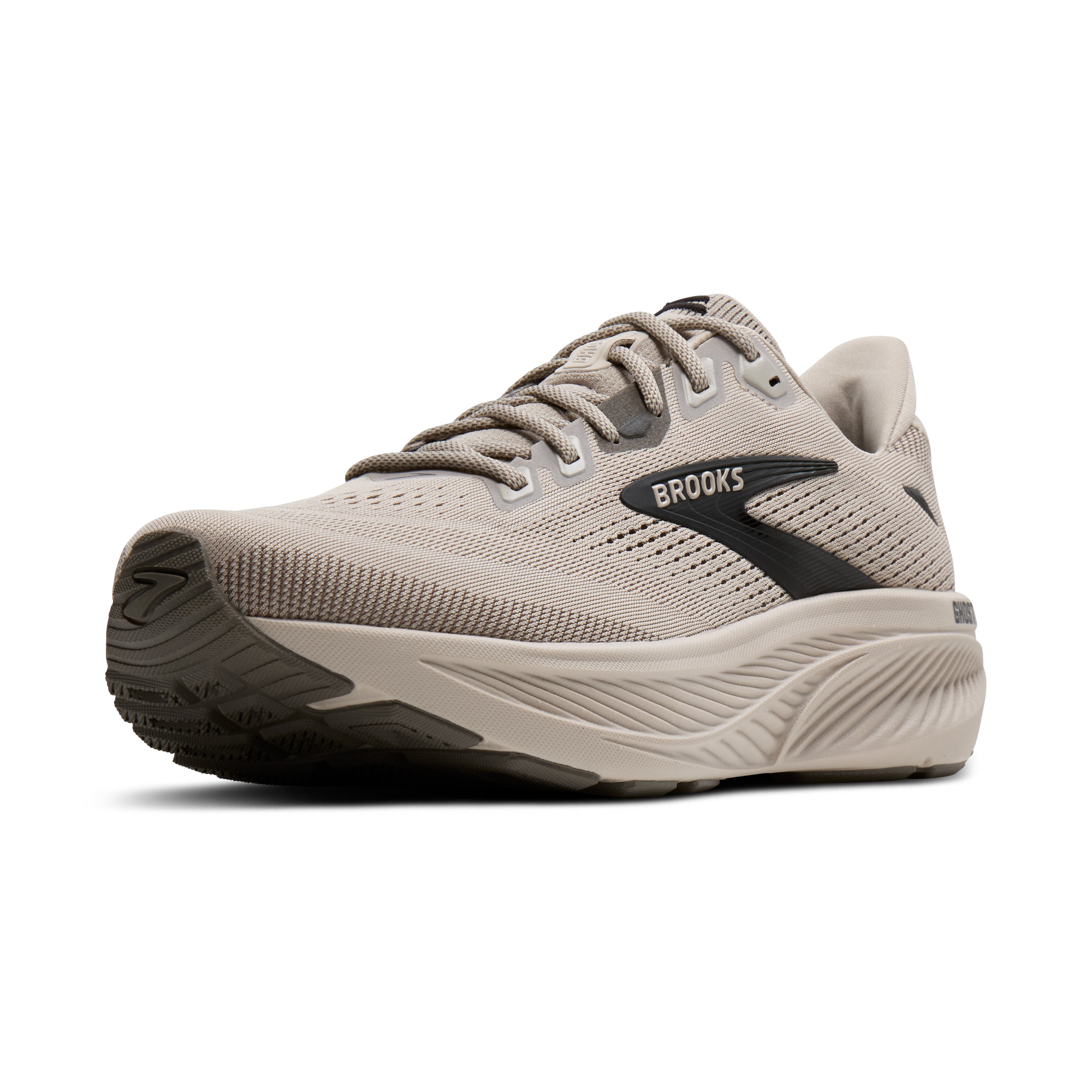 A Brooks running shoe in light taupe and beige with a black logo accent on the side, shown from a three-quarters angle against a white background.