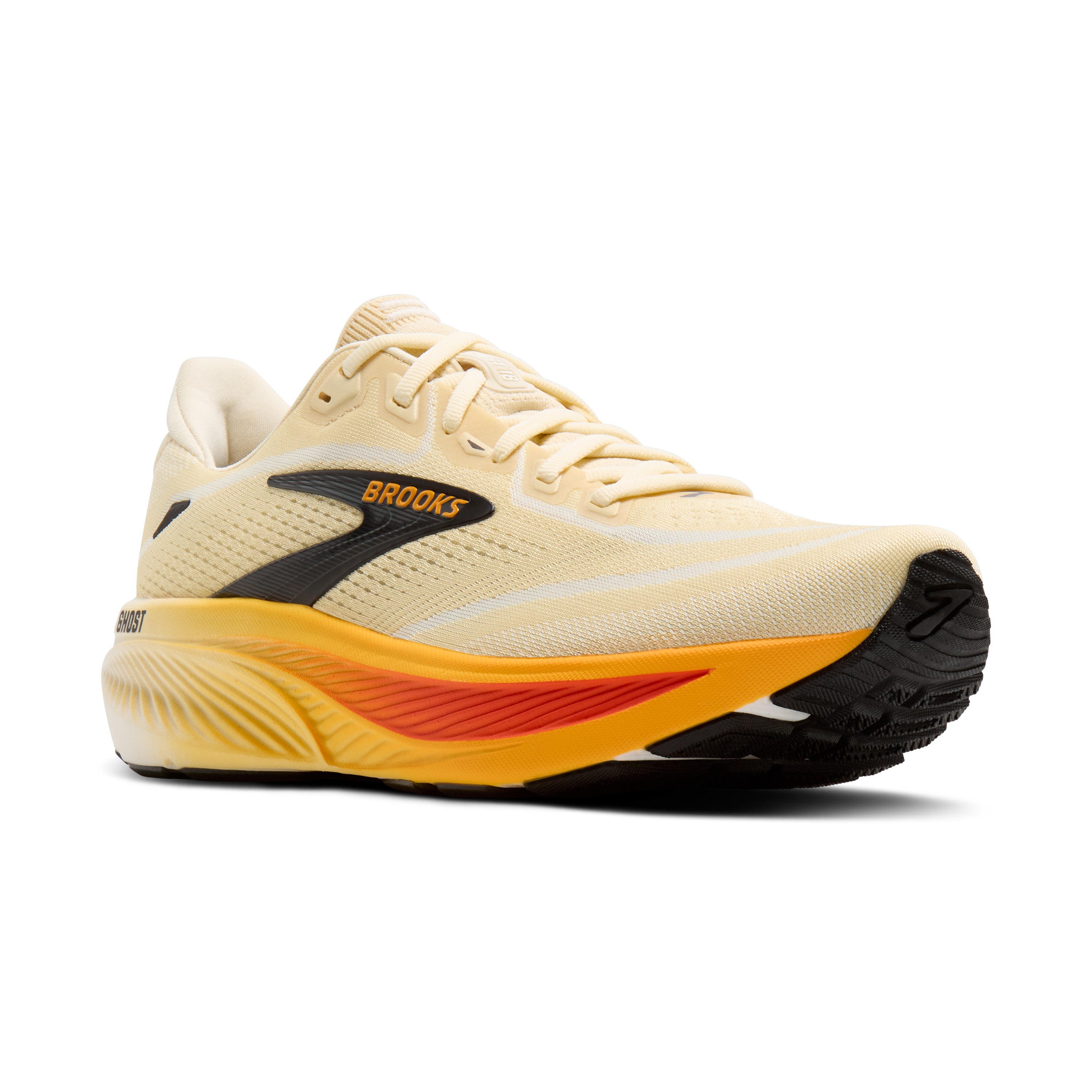 Beige running shoe with orange and black accents on a white background