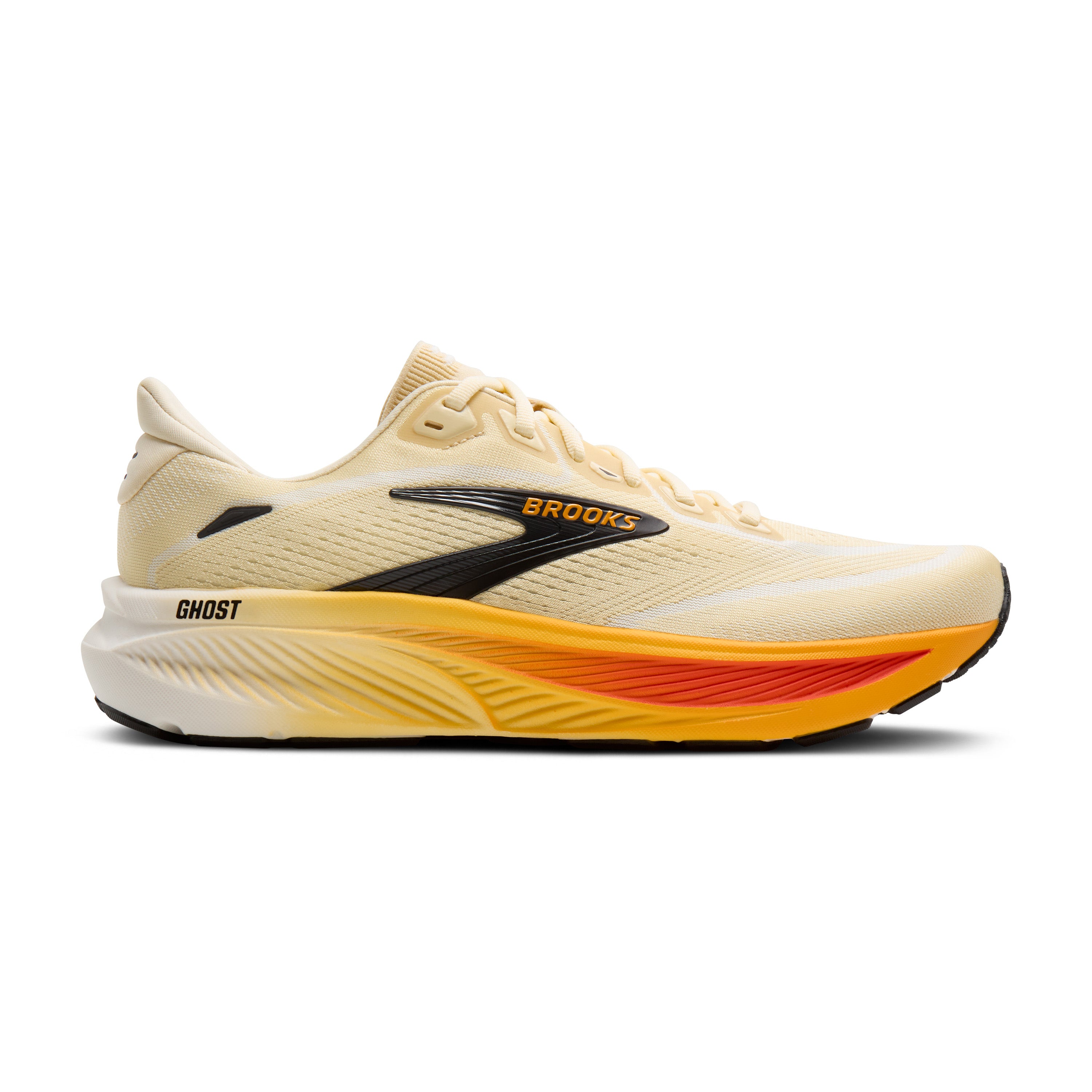 Beige running shoe with orange sole on a white background