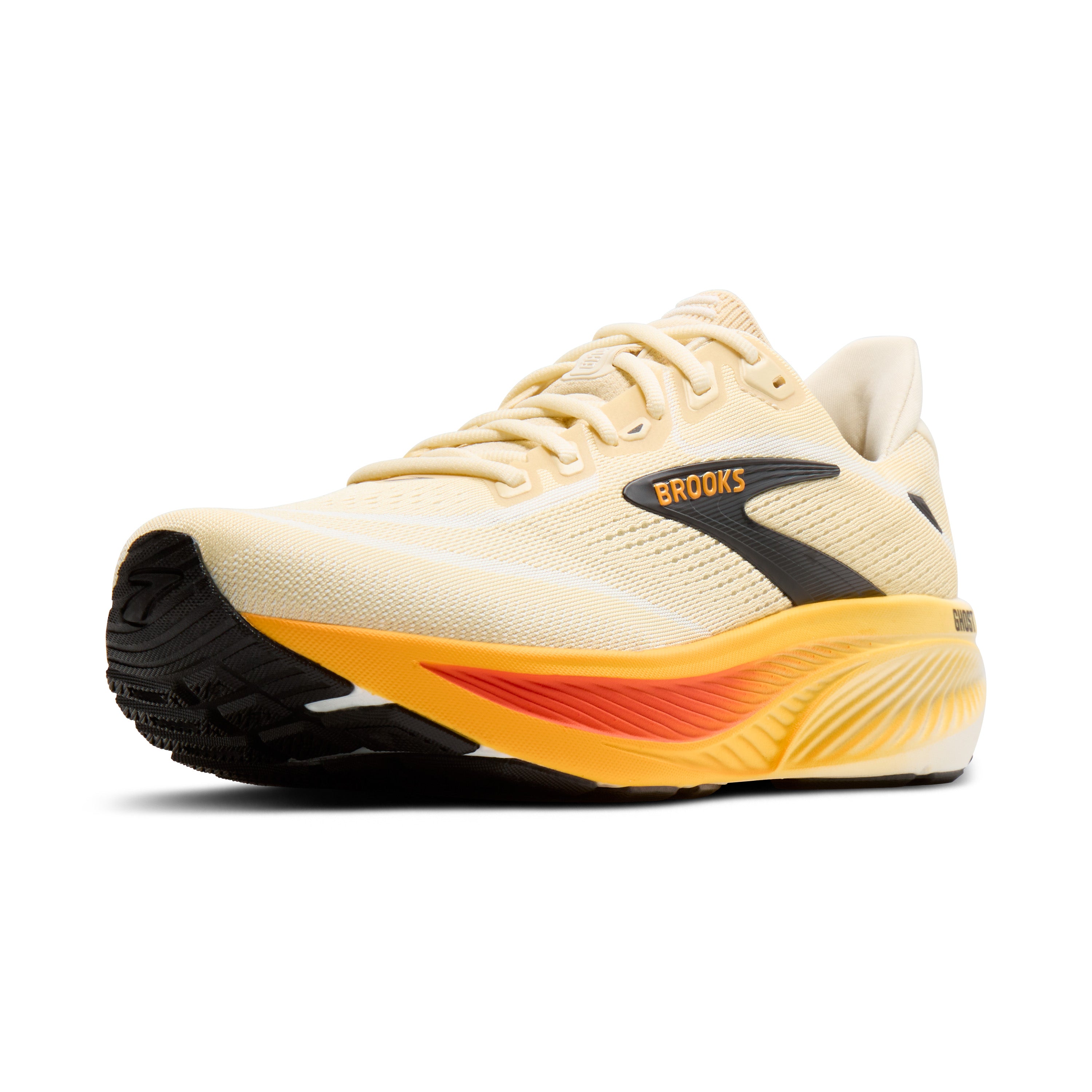 Beige running shoe with orange and black accents on a white background