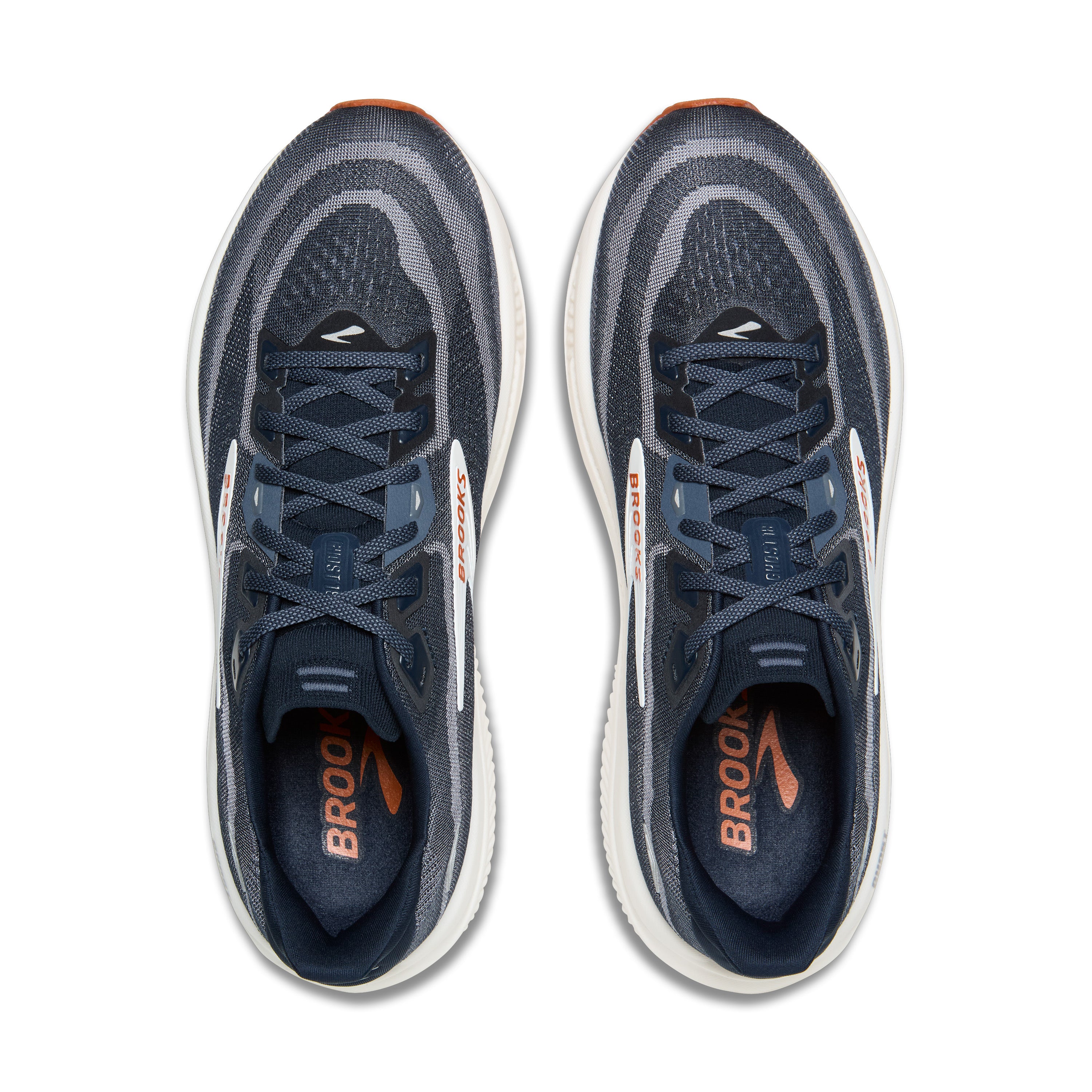 Pair of blue running shoes with white soles on a white background
